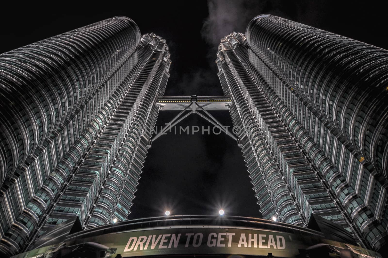 KUALA LUMPUR - APRIL 10: General view of Petronas Twin Towers  at night on Apr 10, 2011 in Kuala Lumpur, Malaysia. The towers are the worlds tallest twin towers with the height of 451.9m.