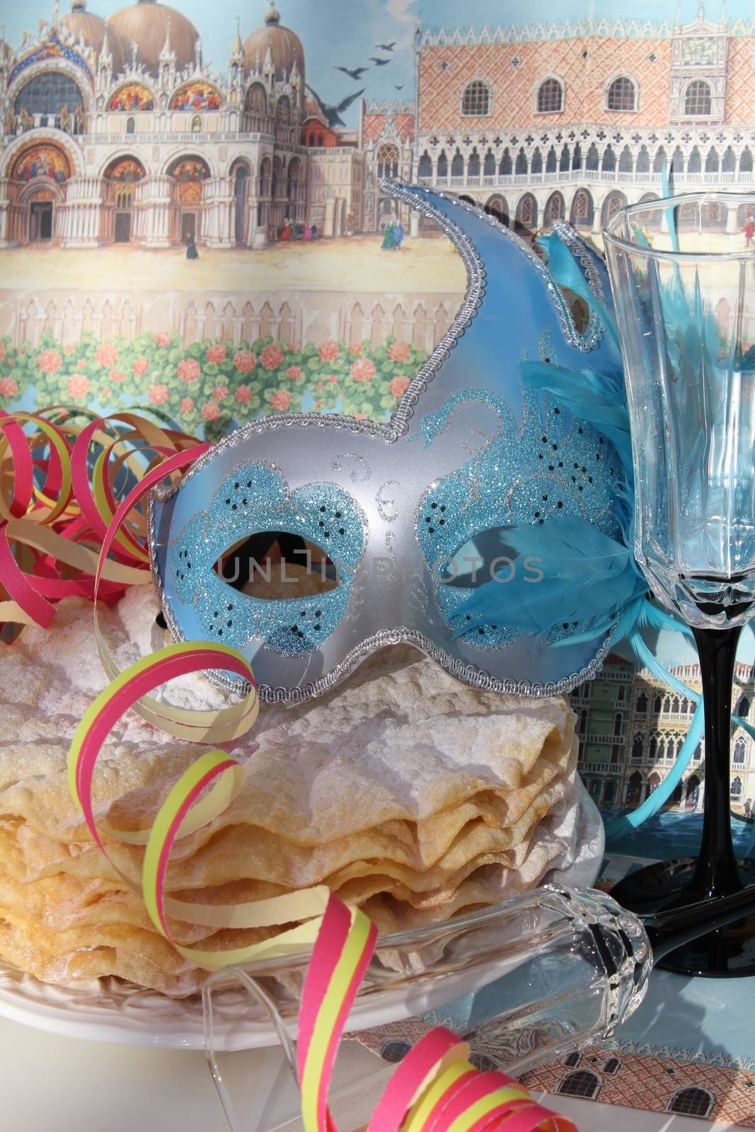 Blue mask and pancakes , with Venise in background