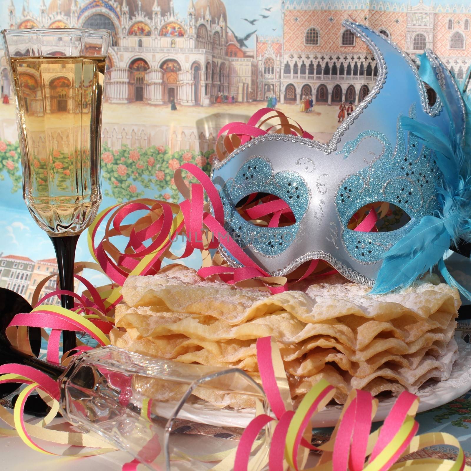 Carnival mask with glitters , pancakes and champagne glasse