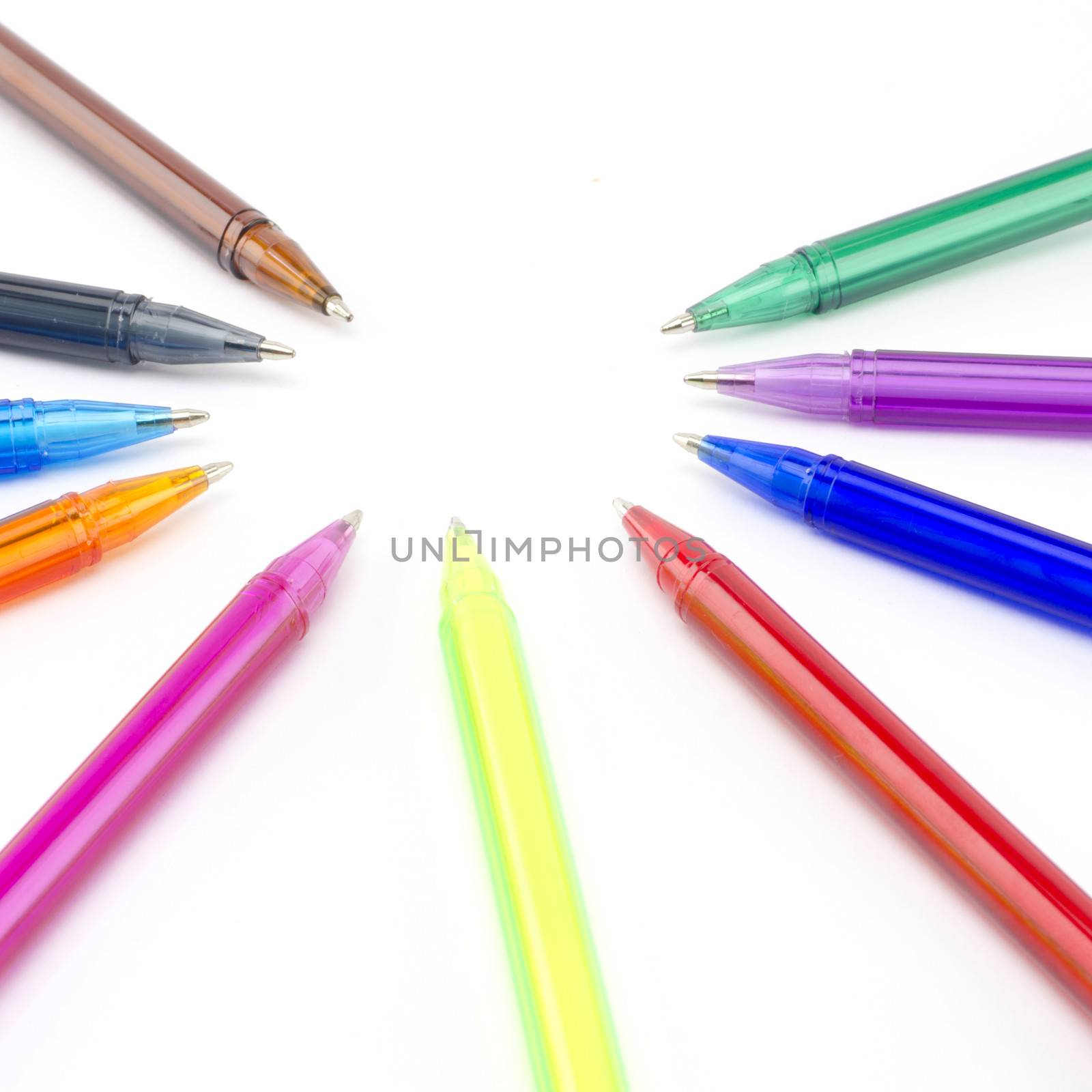 colorful pens isolated on white by ammza12