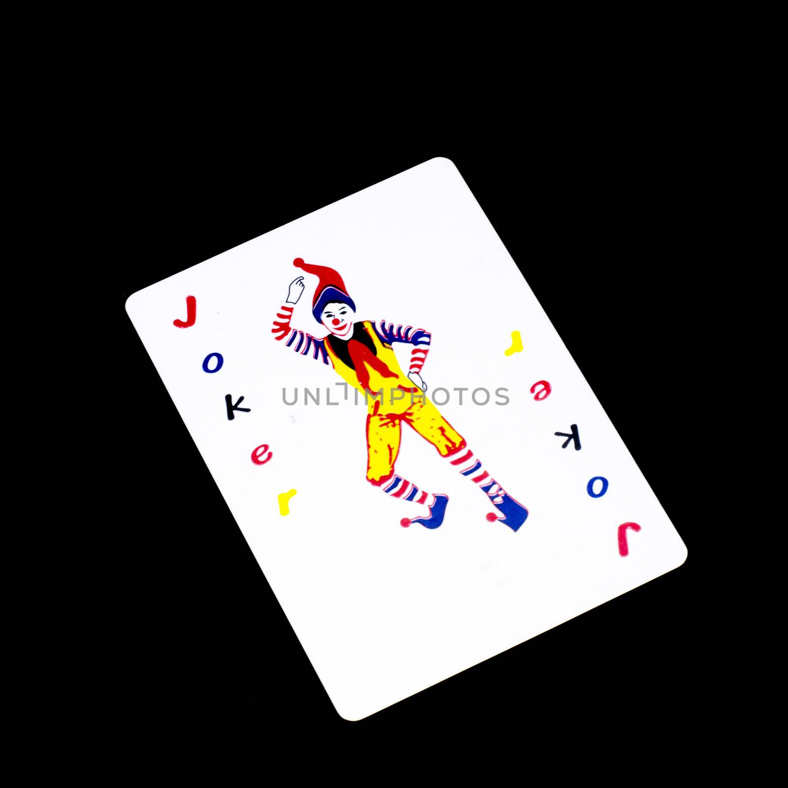 joker card isolated on black background