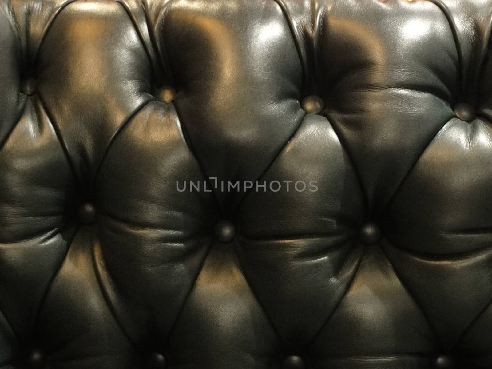 Close up photo of a leather sofa