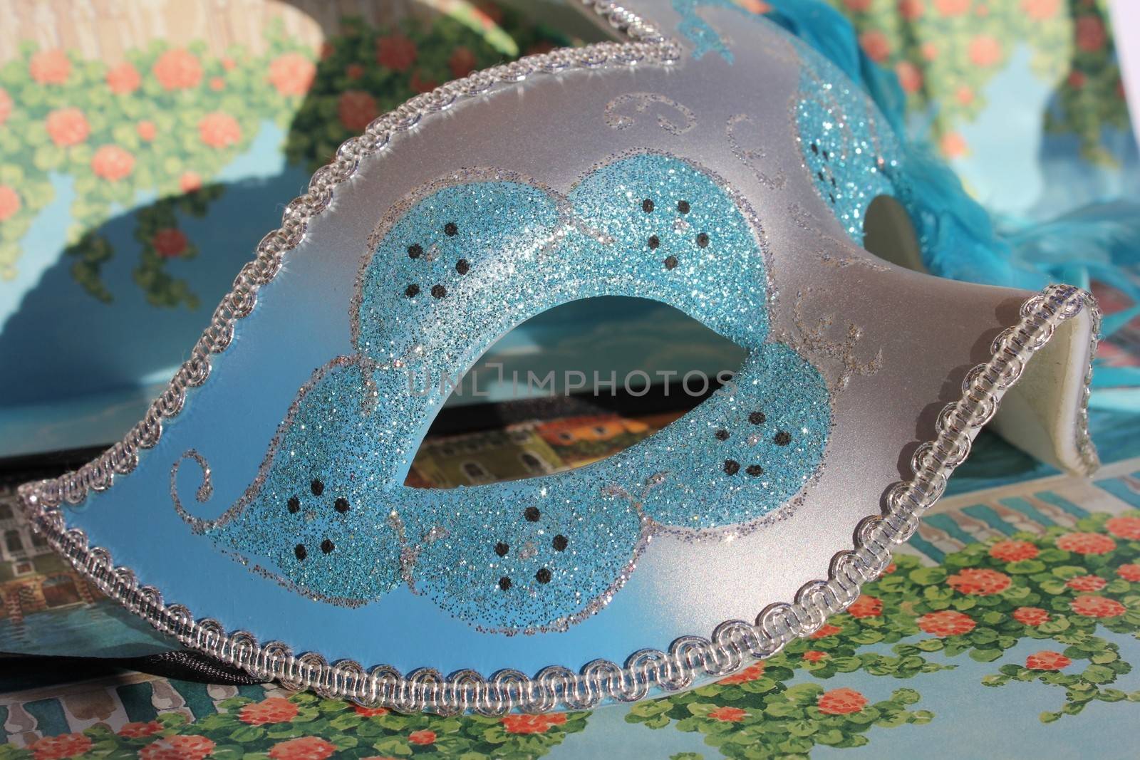 Blue carnival mask with glitters