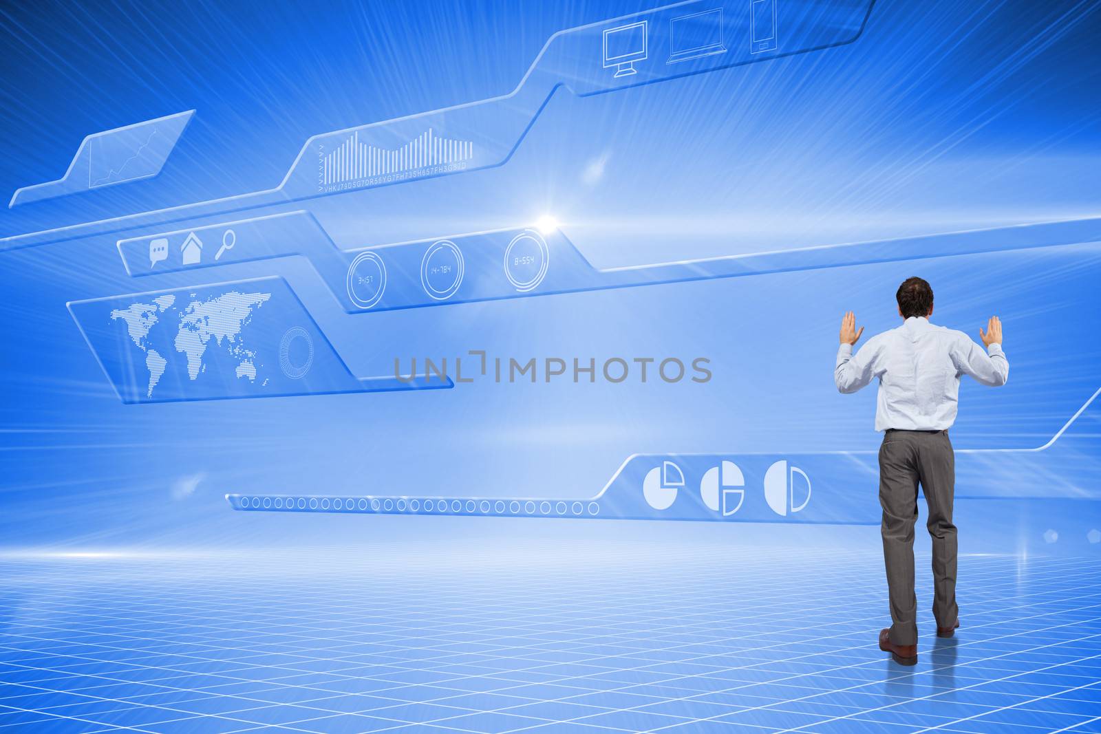 Businessman posing with hands up against futuristic technology interface