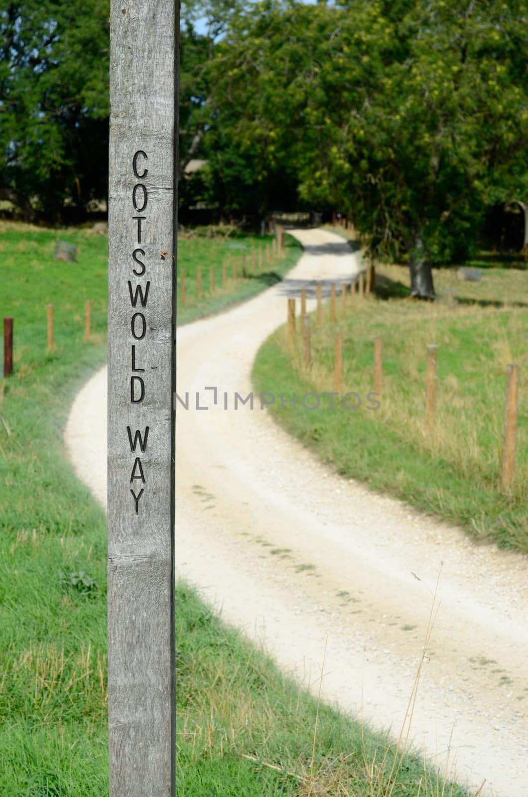 Signpost along the Cotswold Way long-distance footpath through the Cotswolds in western England, UK.