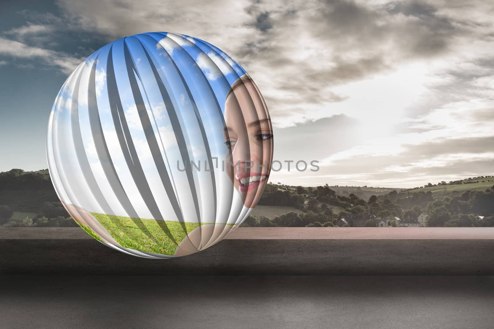 Smiling woman in field on abstract screen against view of landscape from balcony