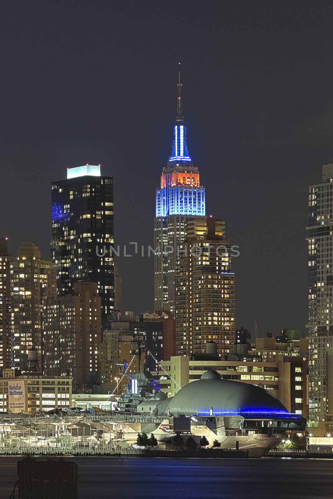 NEW YORK CITY, USA - SEPTEMBER 24: New York Uptown and Intrepid  by hanusst