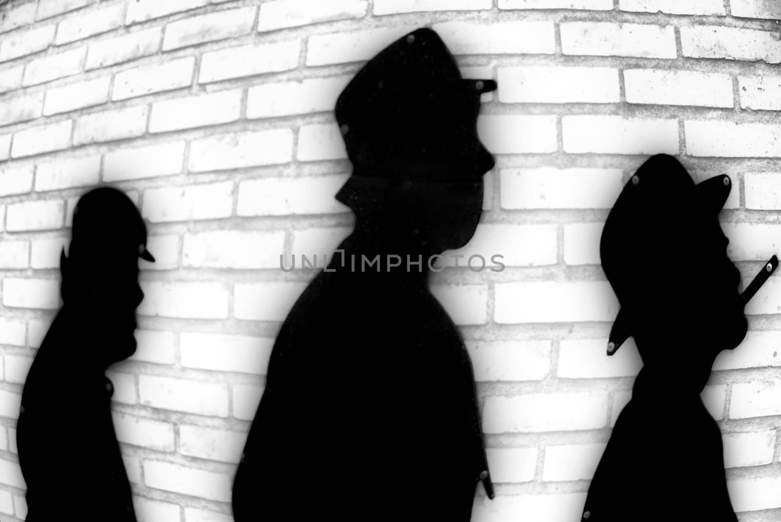 Figures shadow on the wall