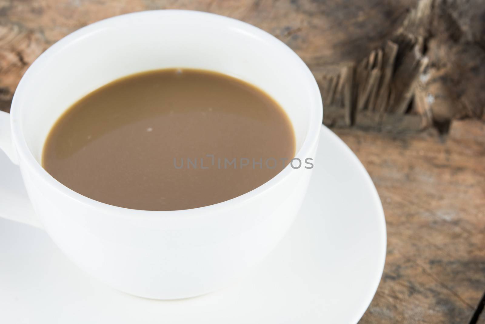 Close up hot coffee drink on wood background