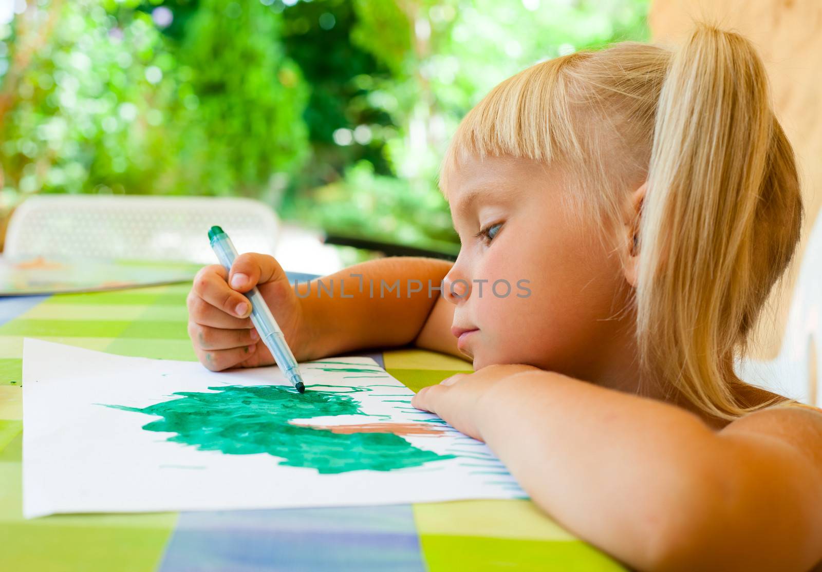 Child drawing outdoors by naumoid