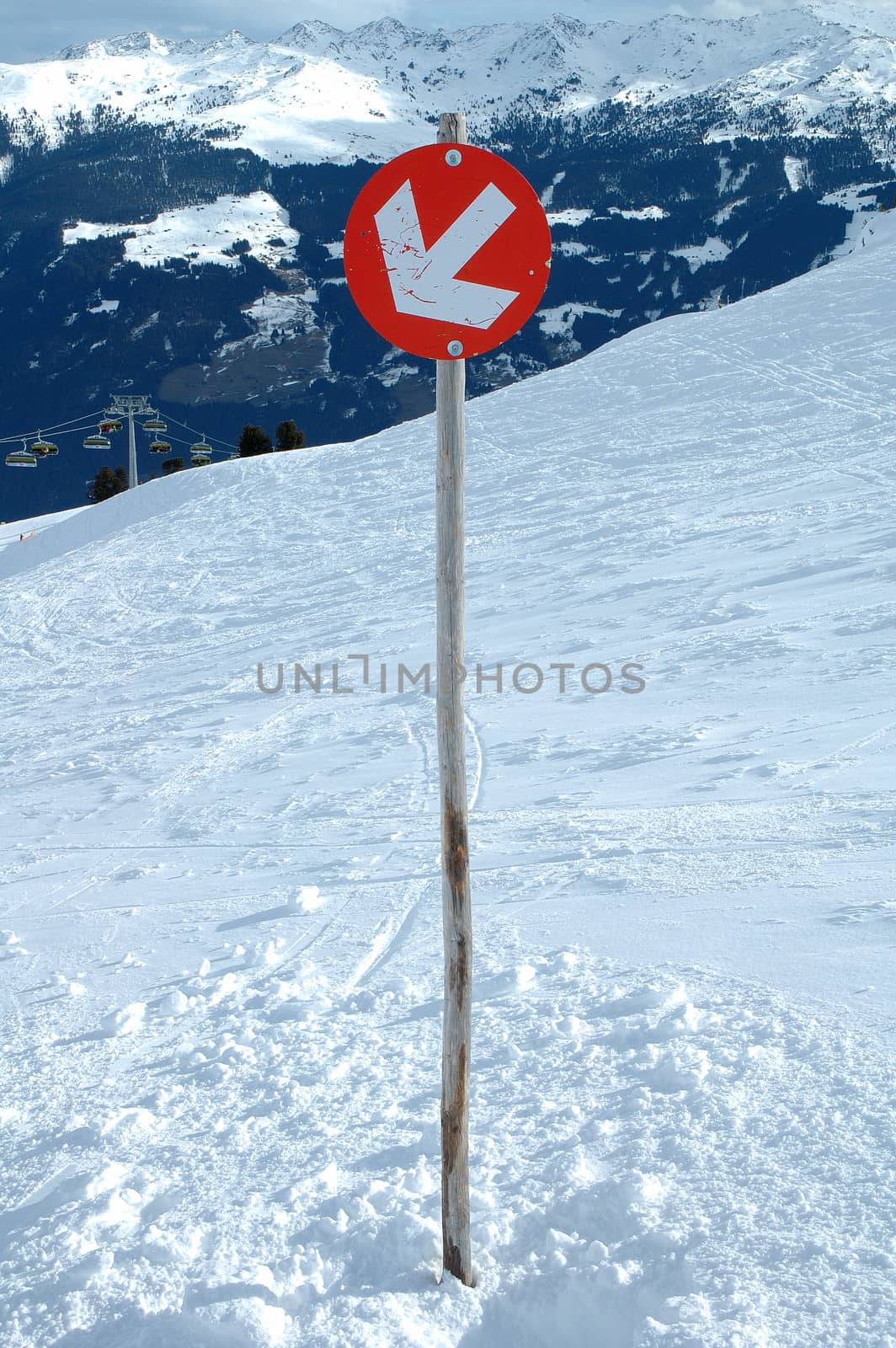 Slope direction sign on the slope in Austria nearby Kaltenbach in Zillertal valley