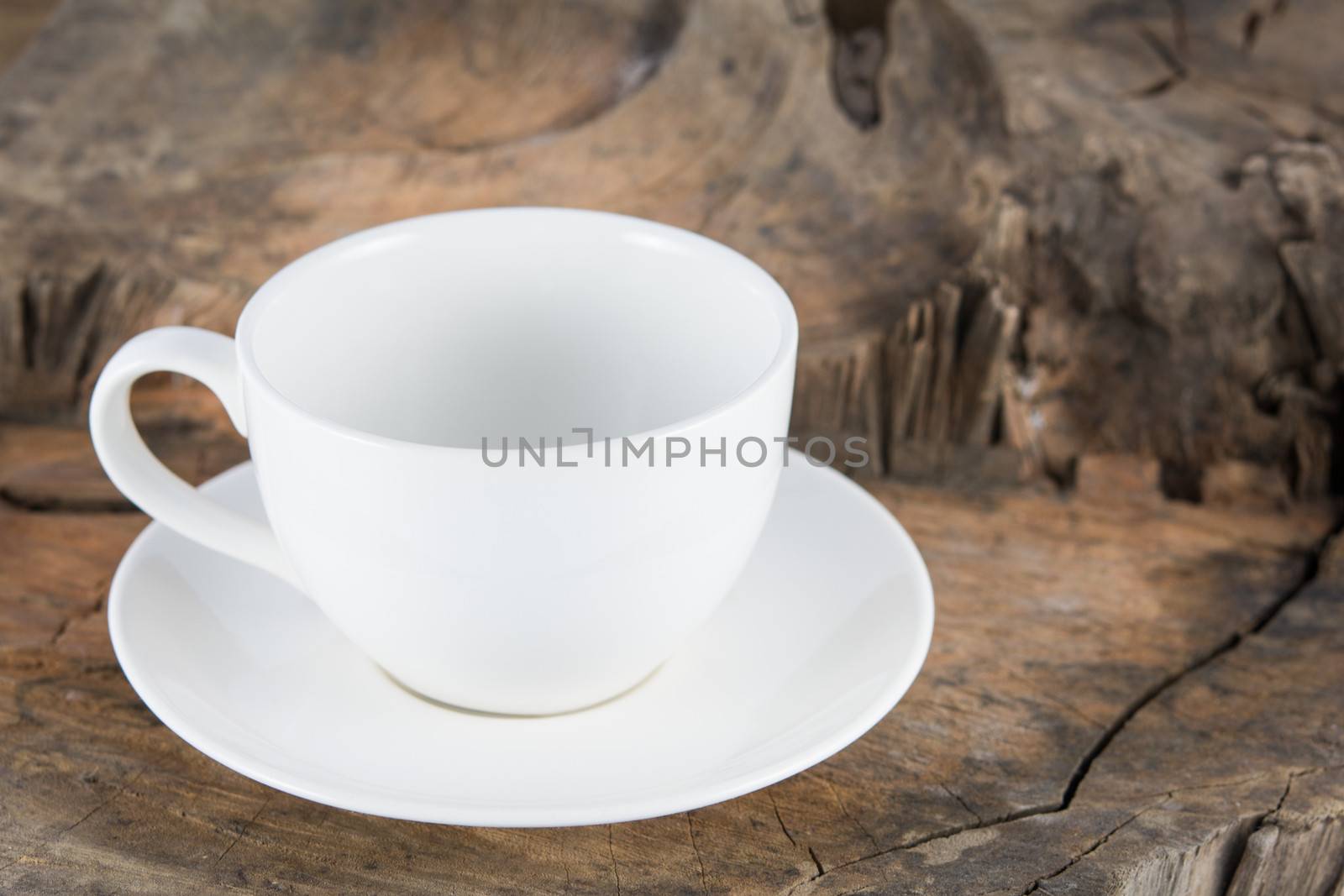 Close up coffee cup on wood background