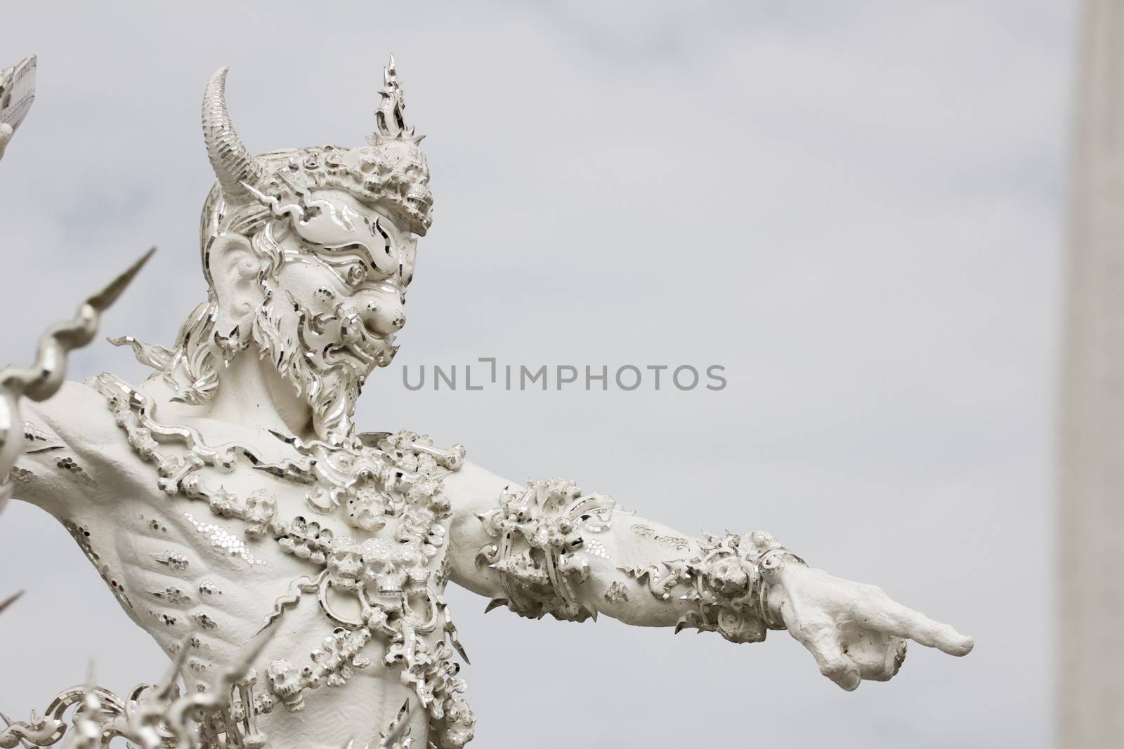 white sculpture of giant by a3701027