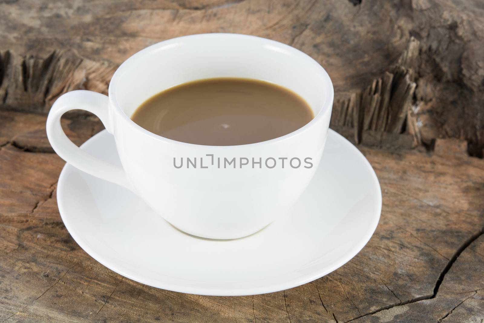 Close up hot coffee drink on wood background
