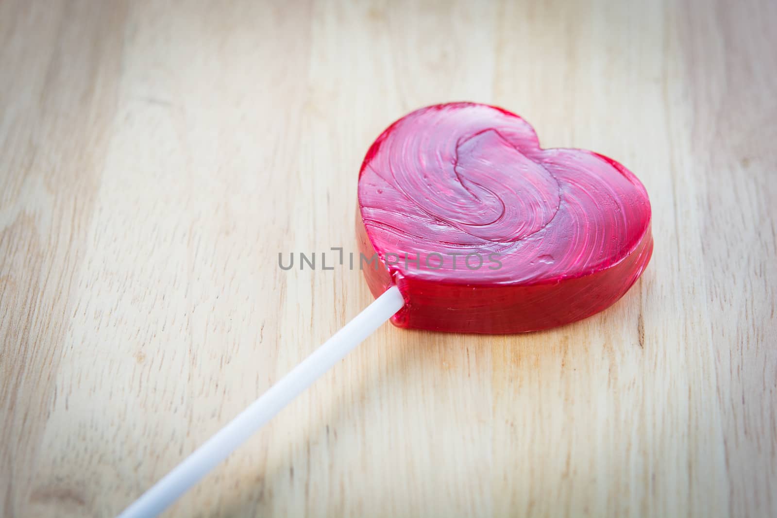 Heart shaped colorful lollipop by Sorapop