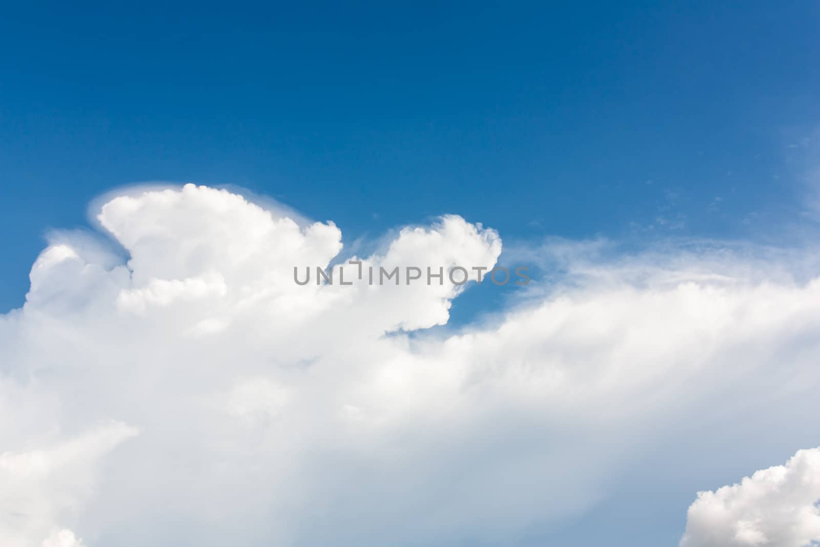 The white clouds background in blue sky