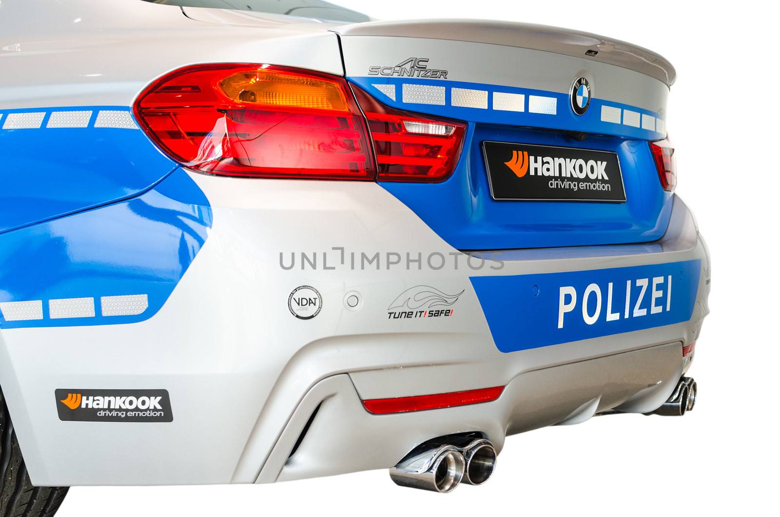 MUNICH, GERMANY - DECEMBER 27, 2013: Back view of new modern model BMW German police patrol car. Isolated on white,