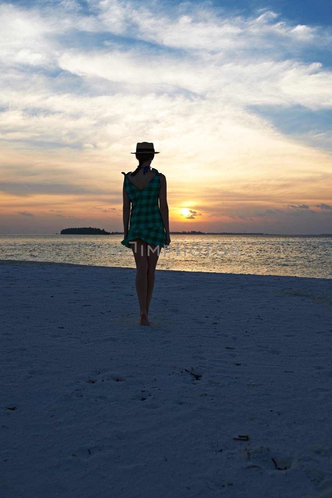 Woman at beach by haveseen