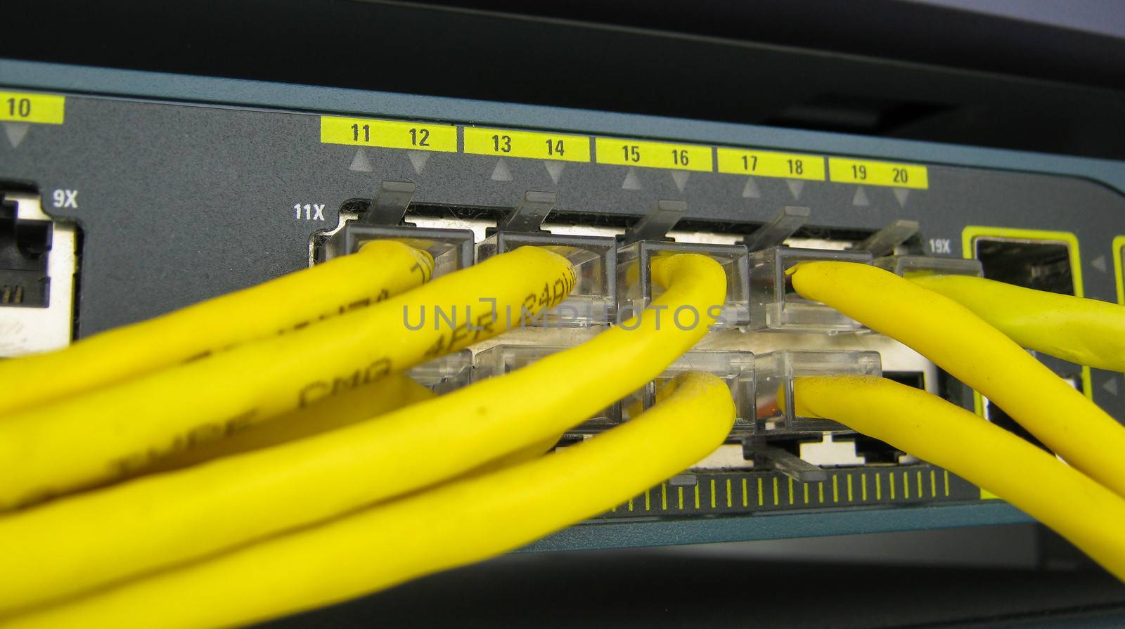 Ethernet RJ45 cables are connected to internet switch by Sorapop