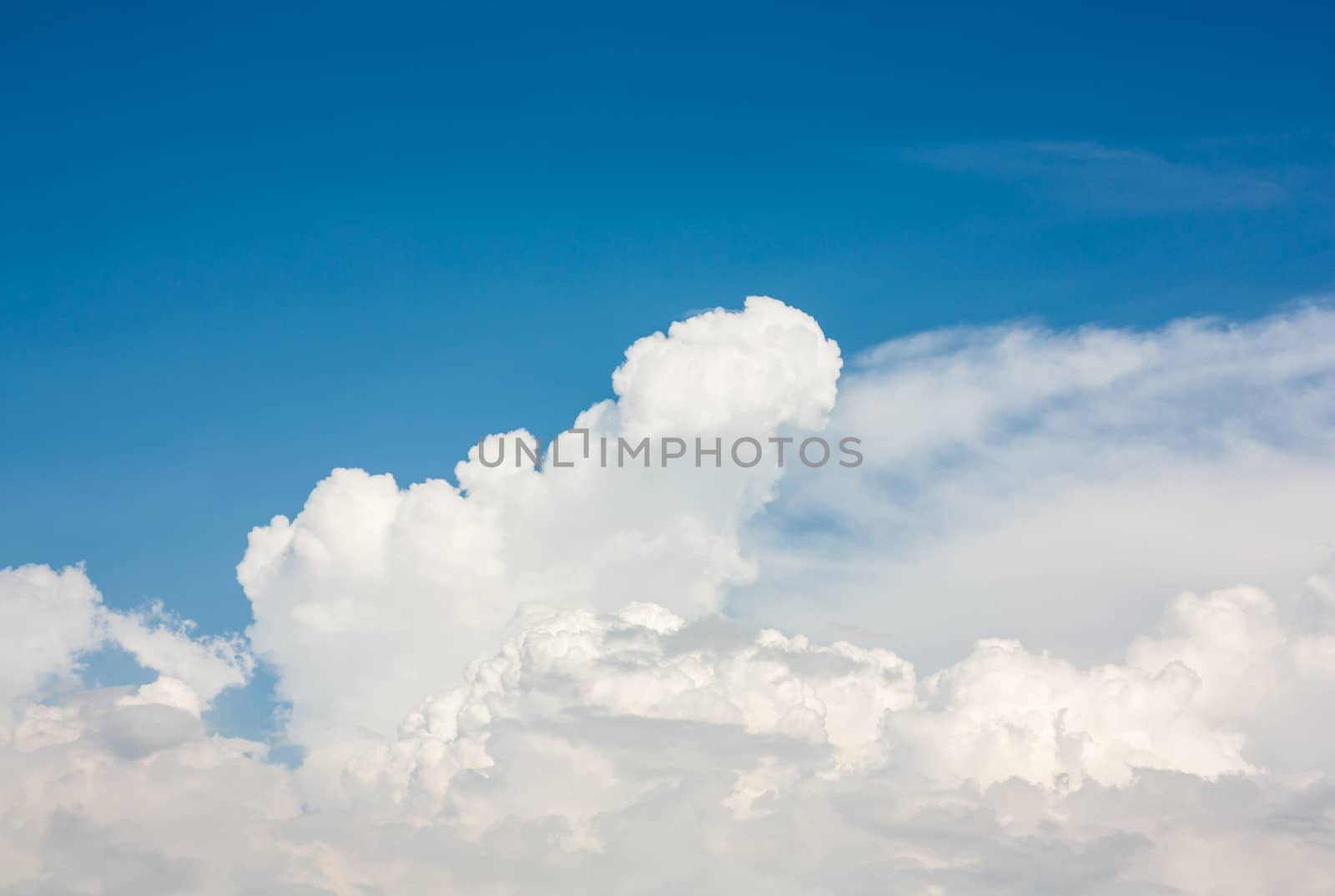 The white clouds background in blue sky