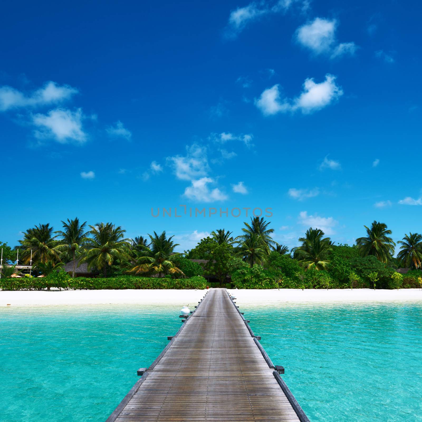 Beautiful beach with jetty at Maldives