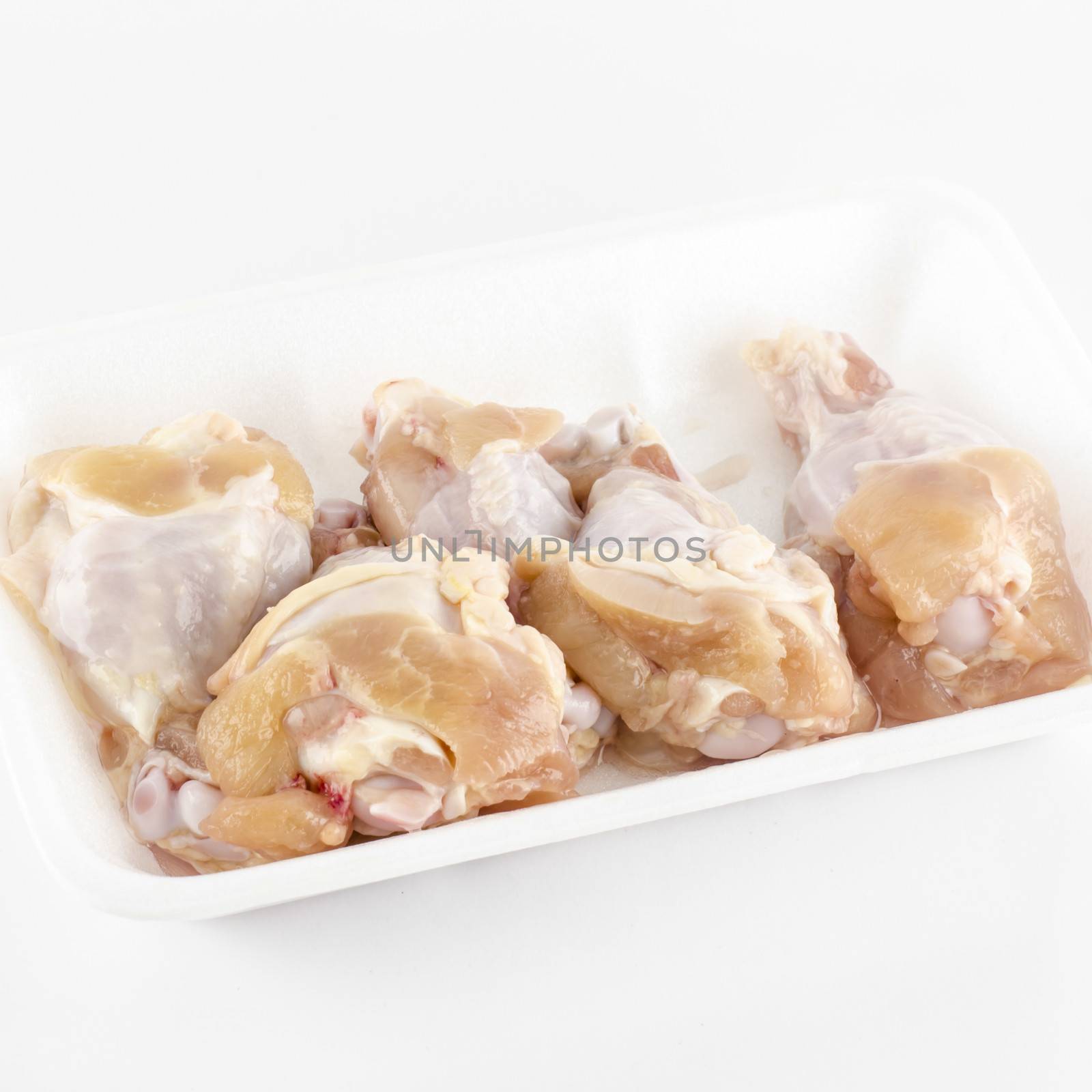 fresh chicken isolated on white background by ammza12