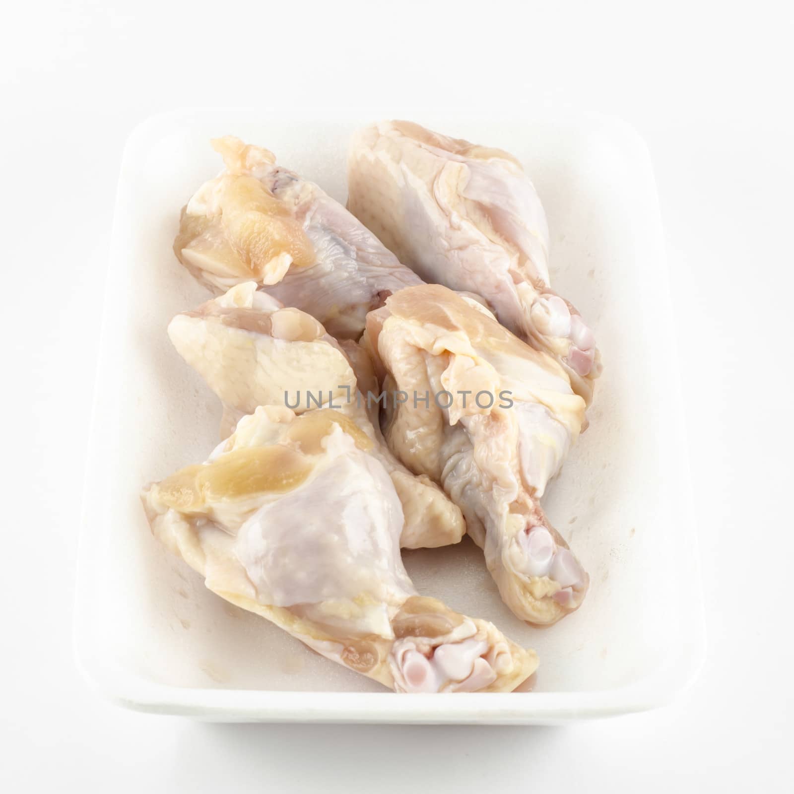 fresh chicken isolated on white background by ammza12