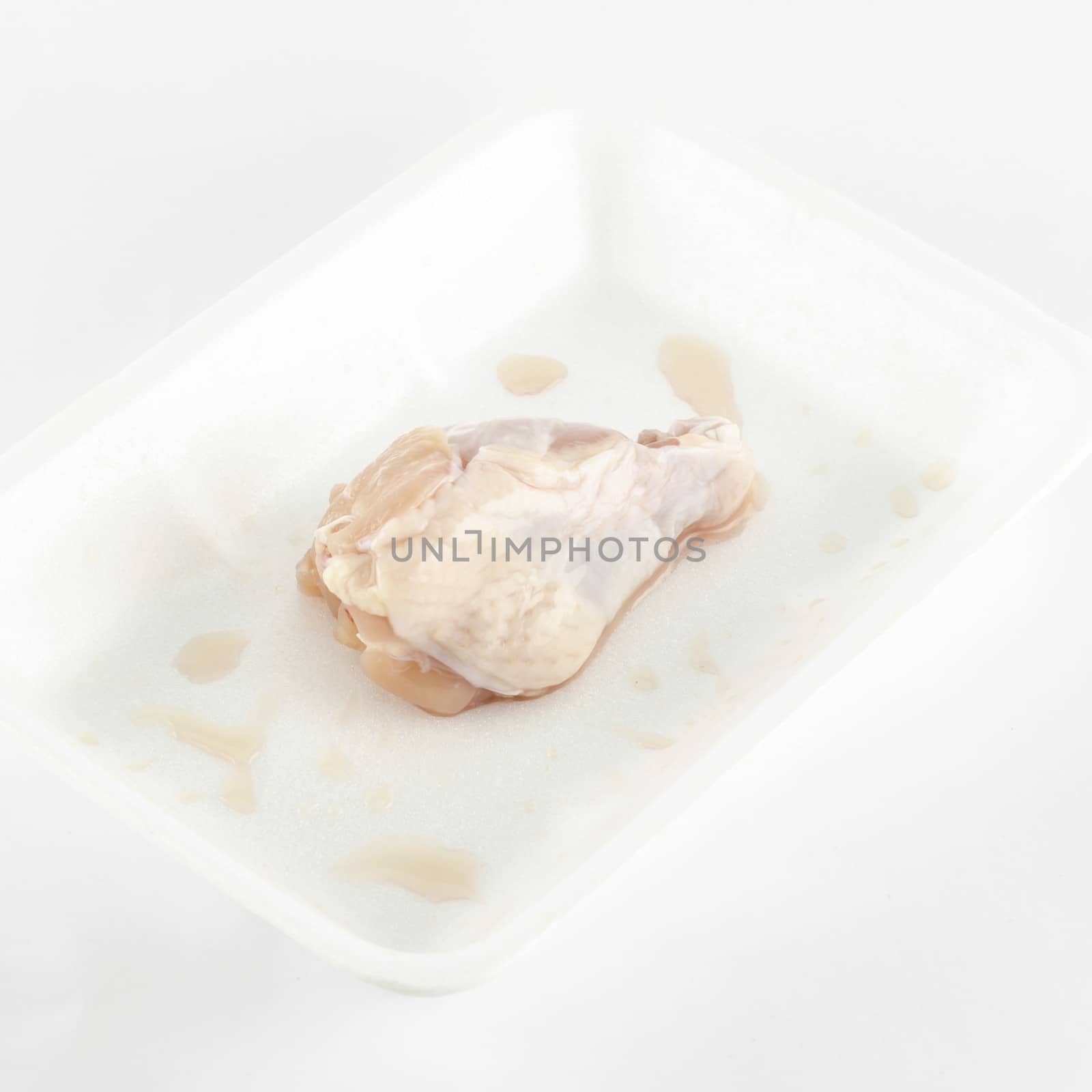 fresh chicken isolated on white background by ammza12