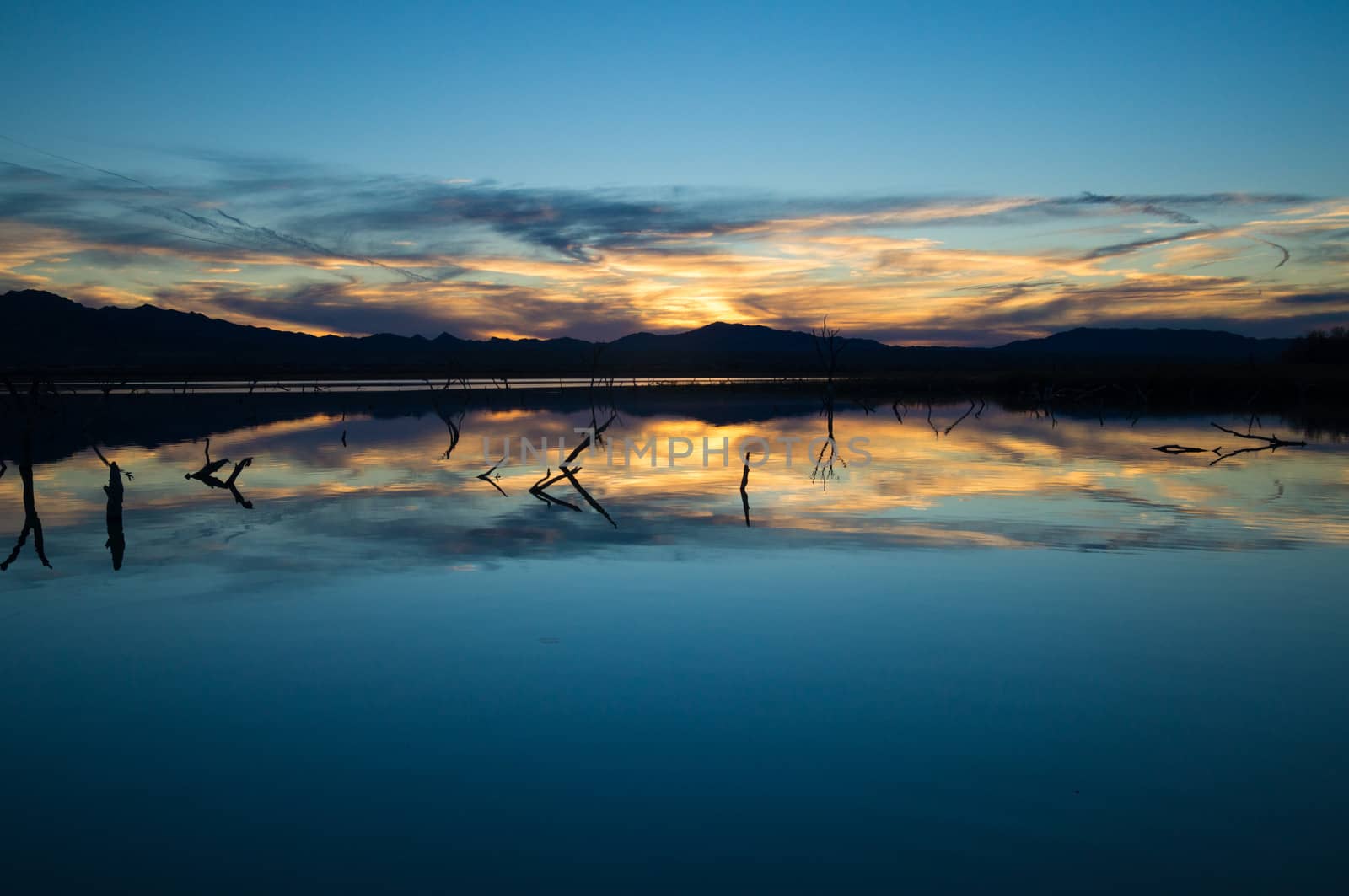 Calm lake at sunset