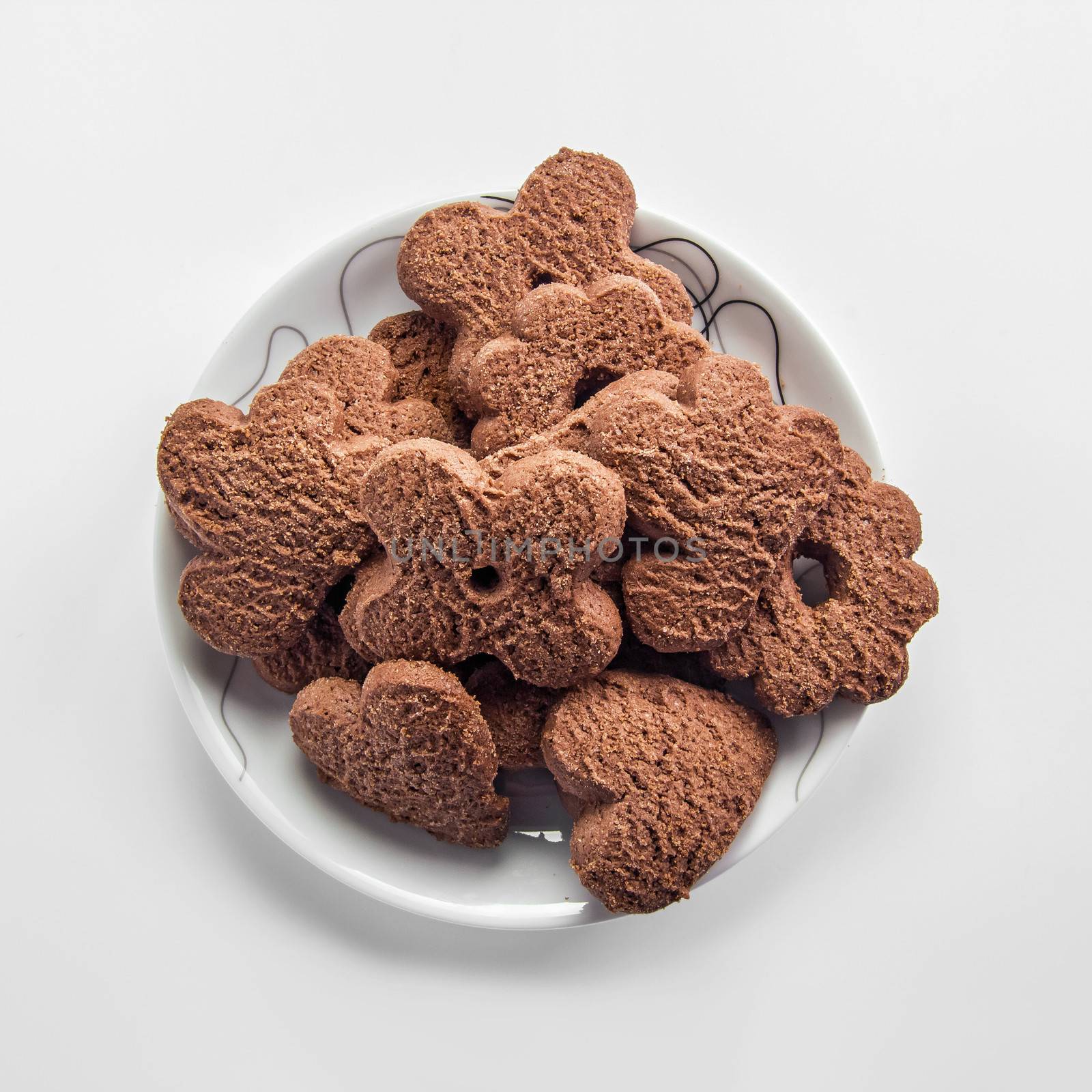 Chocolate cookies on dish by dynamicfoto