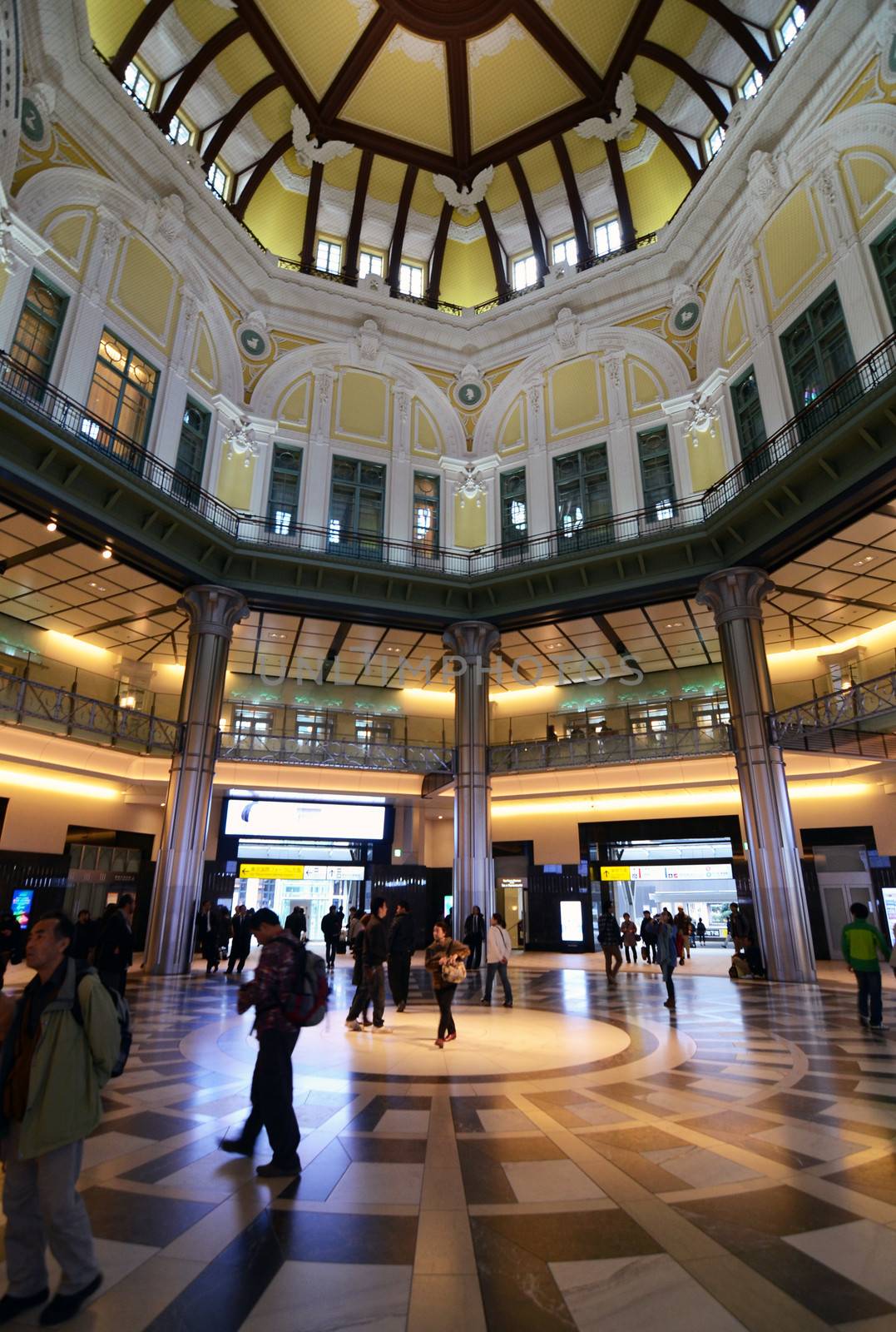 TOKYO - NOV 26: Japanese peoples in Tokyo Station by siraanamwong