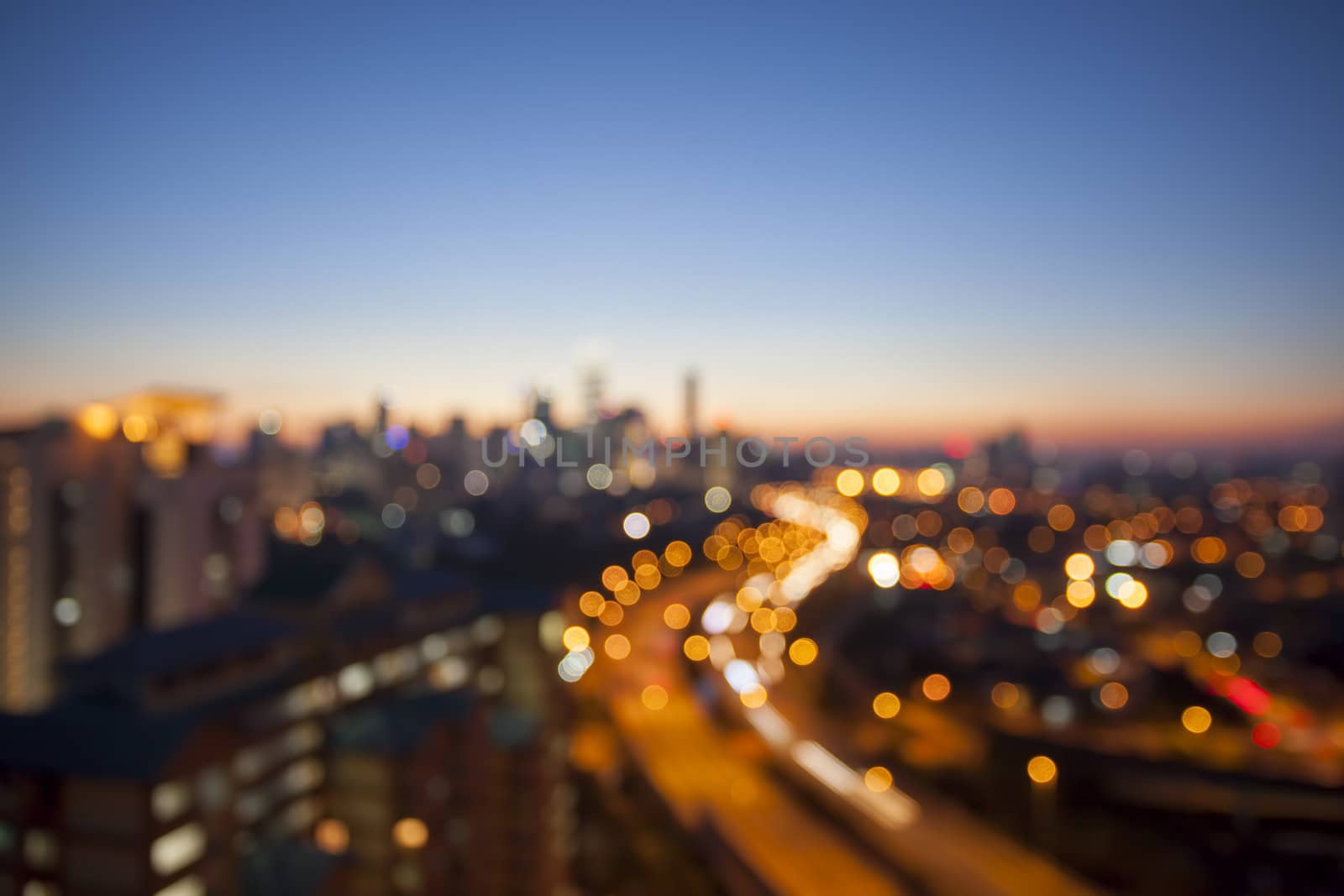 Ampang Kuala Lumpur Elevated Highway AKLEH with City Skyline in Malaysia at Twilight Blurred Defocused Bokeh Background