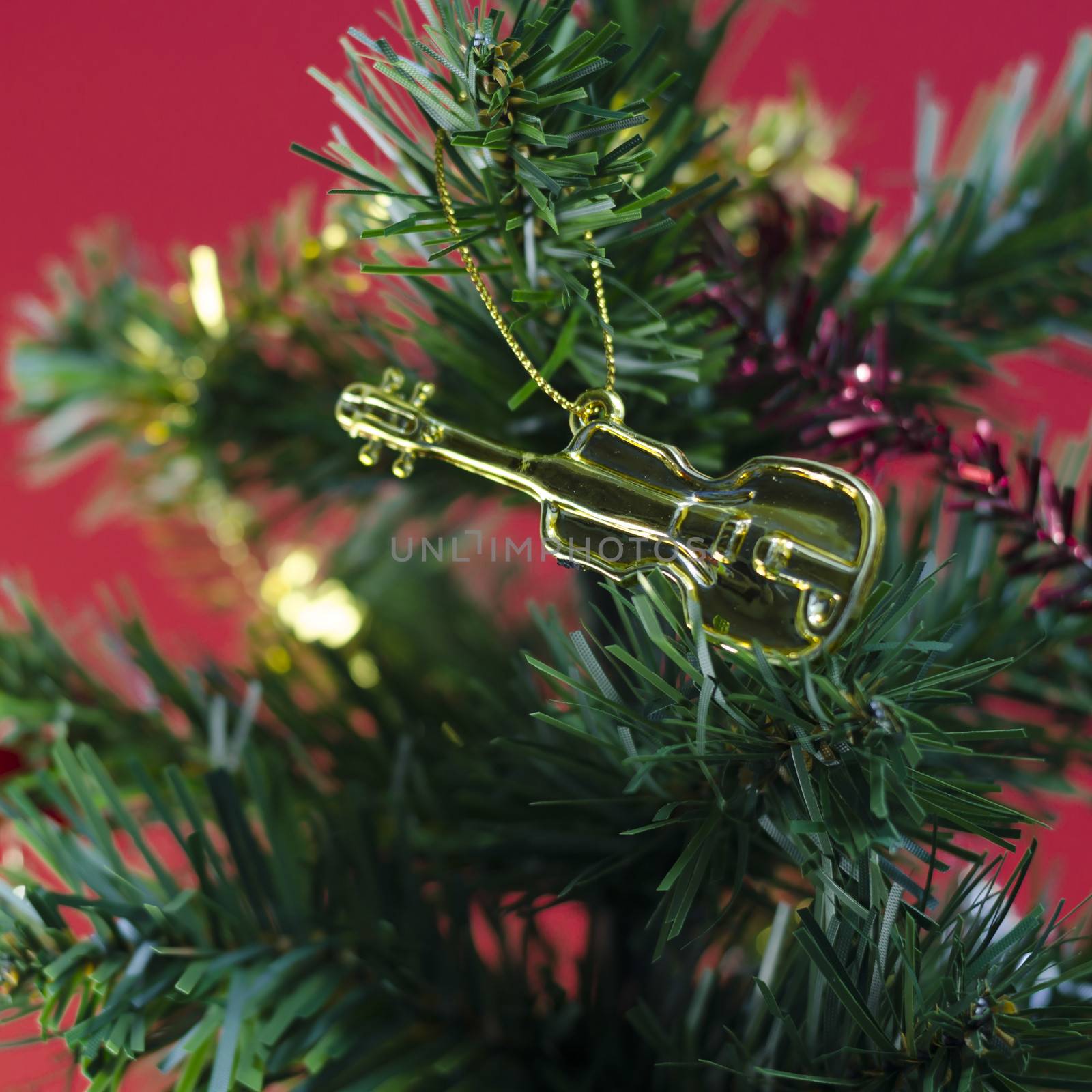 close up violin on christmas tree