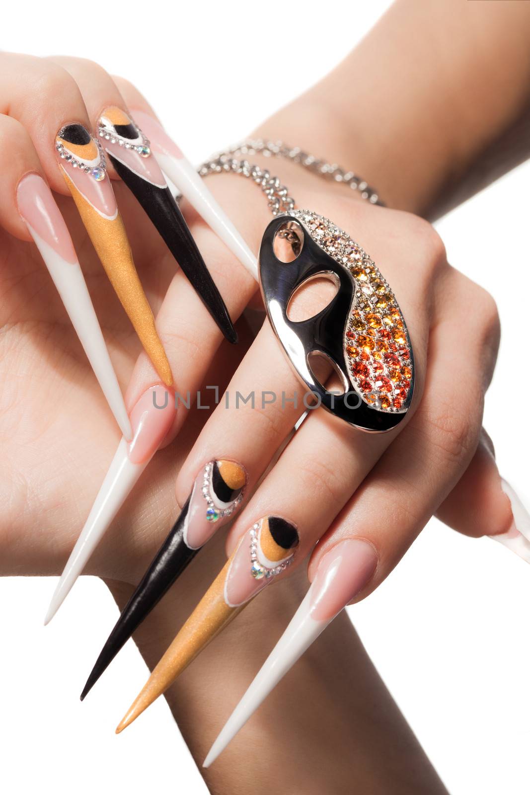 extremely long nails with nail-art and crystal jewellery,