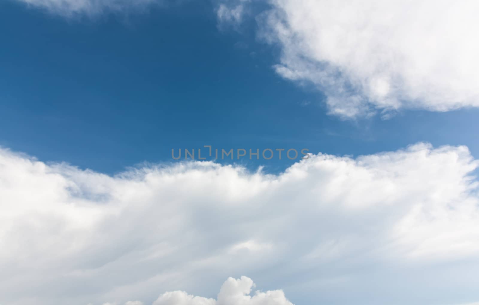 clouds in blue sky by Sorapop