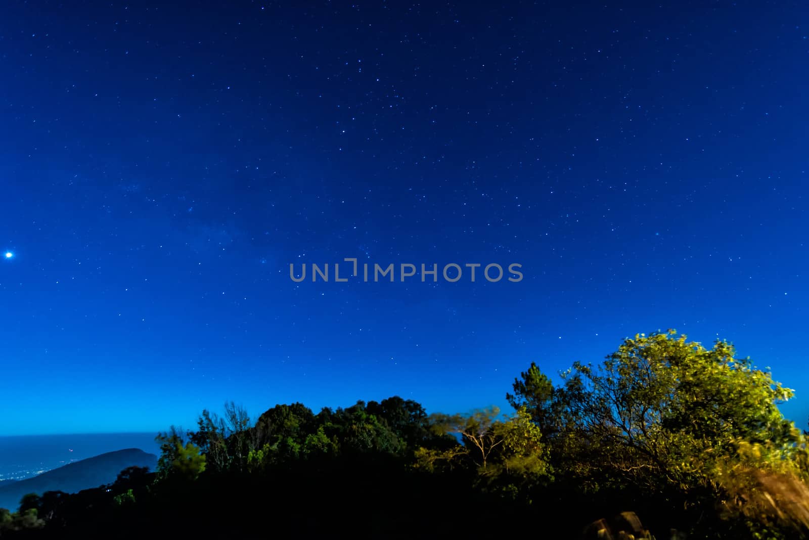 Star in blue sky night time scene by moggara12