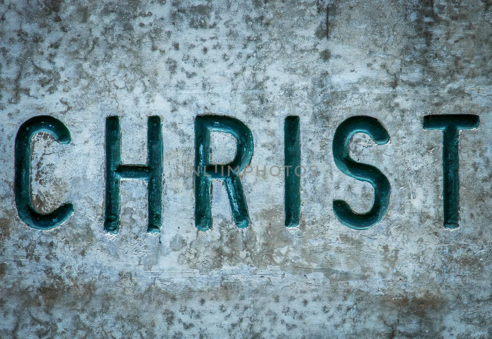 Religious Concept Image Of The Word Christ Chiseled Into Wall
