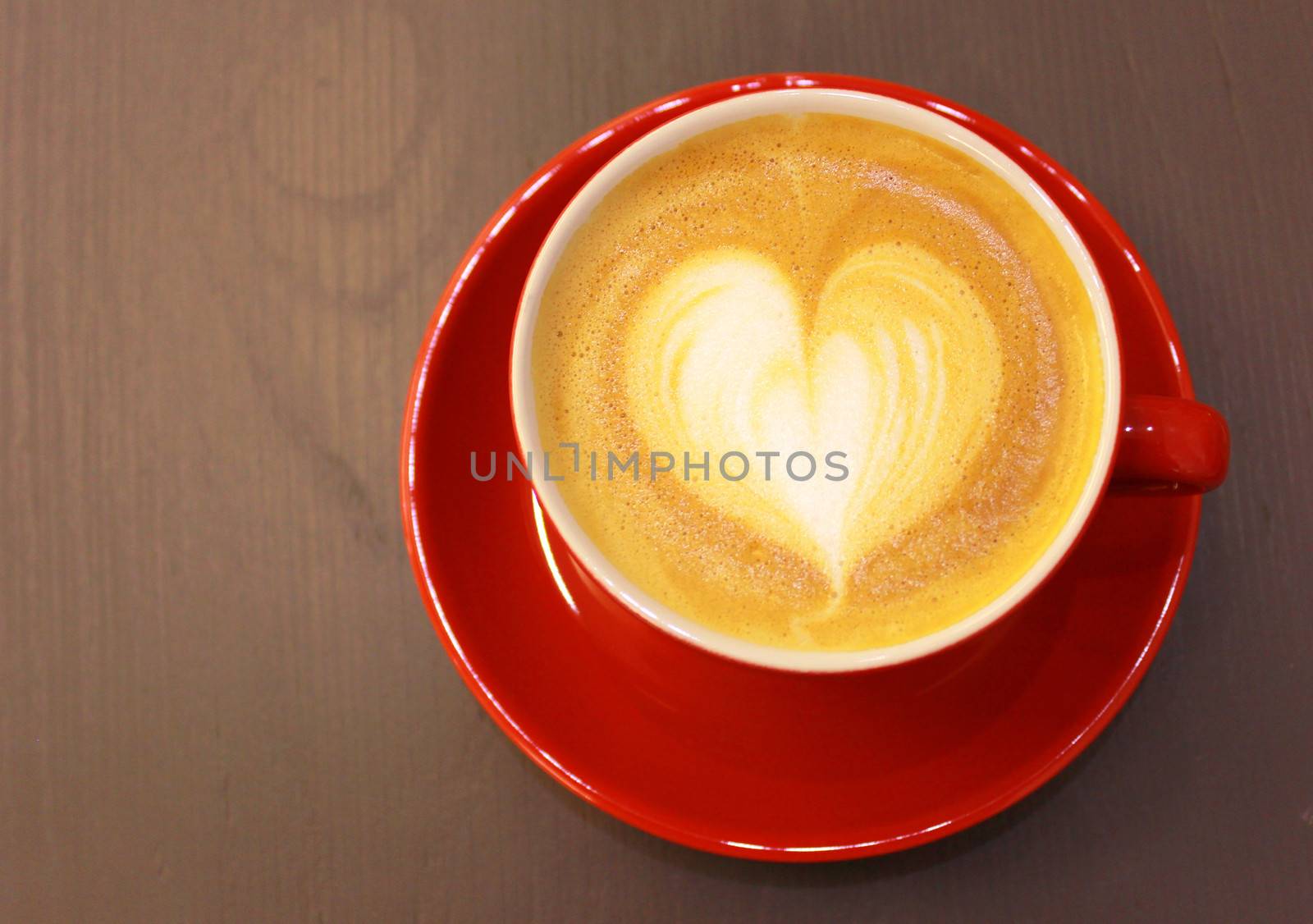Cappuccino or latte coffee with heart shape  by nuchylee