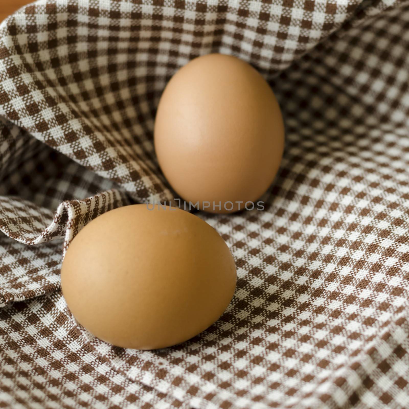 egg in kitchen towel on table