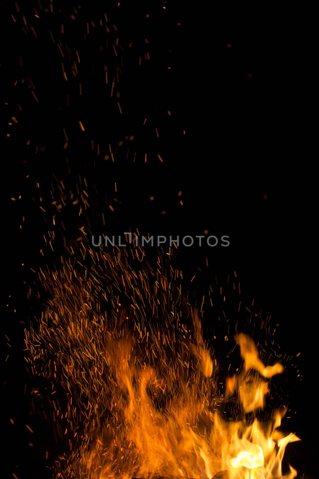 Fire and orange sparks on a black background