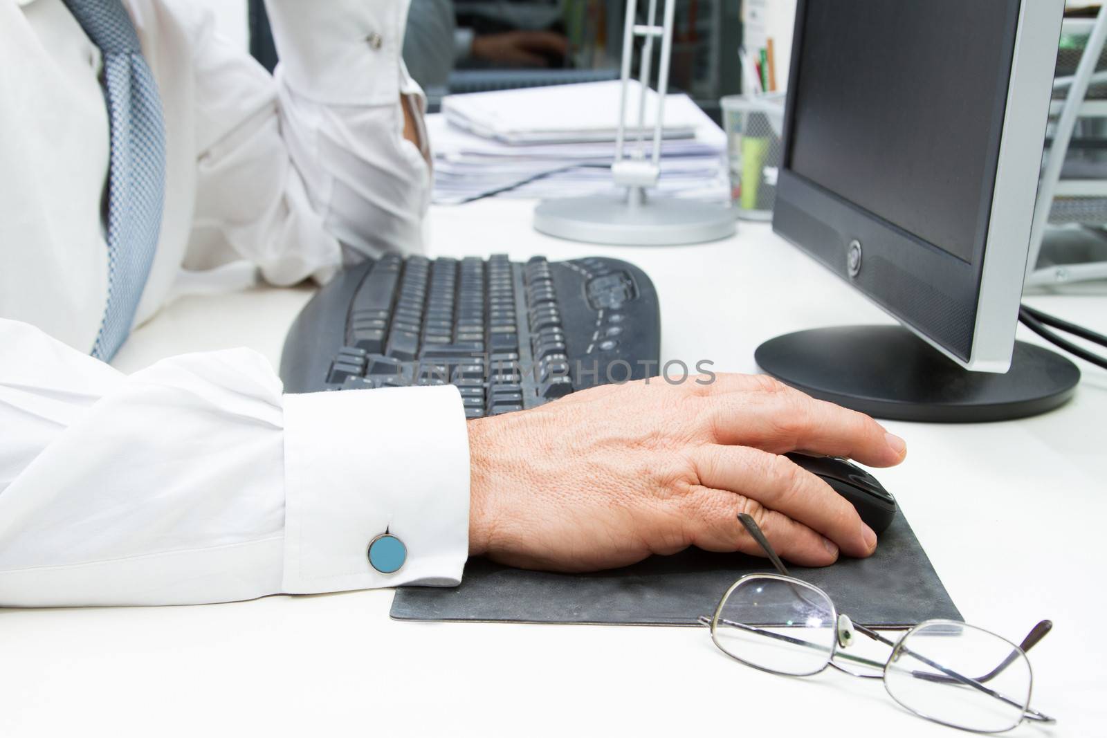 Man hand typing on computer