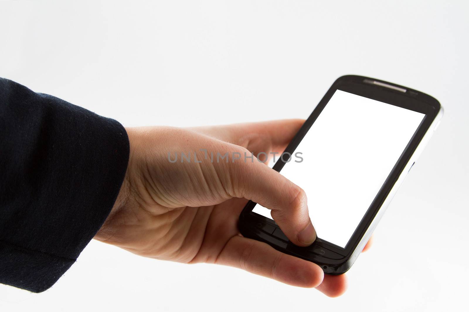 Close-up of female hands using a smart phone, in a white background