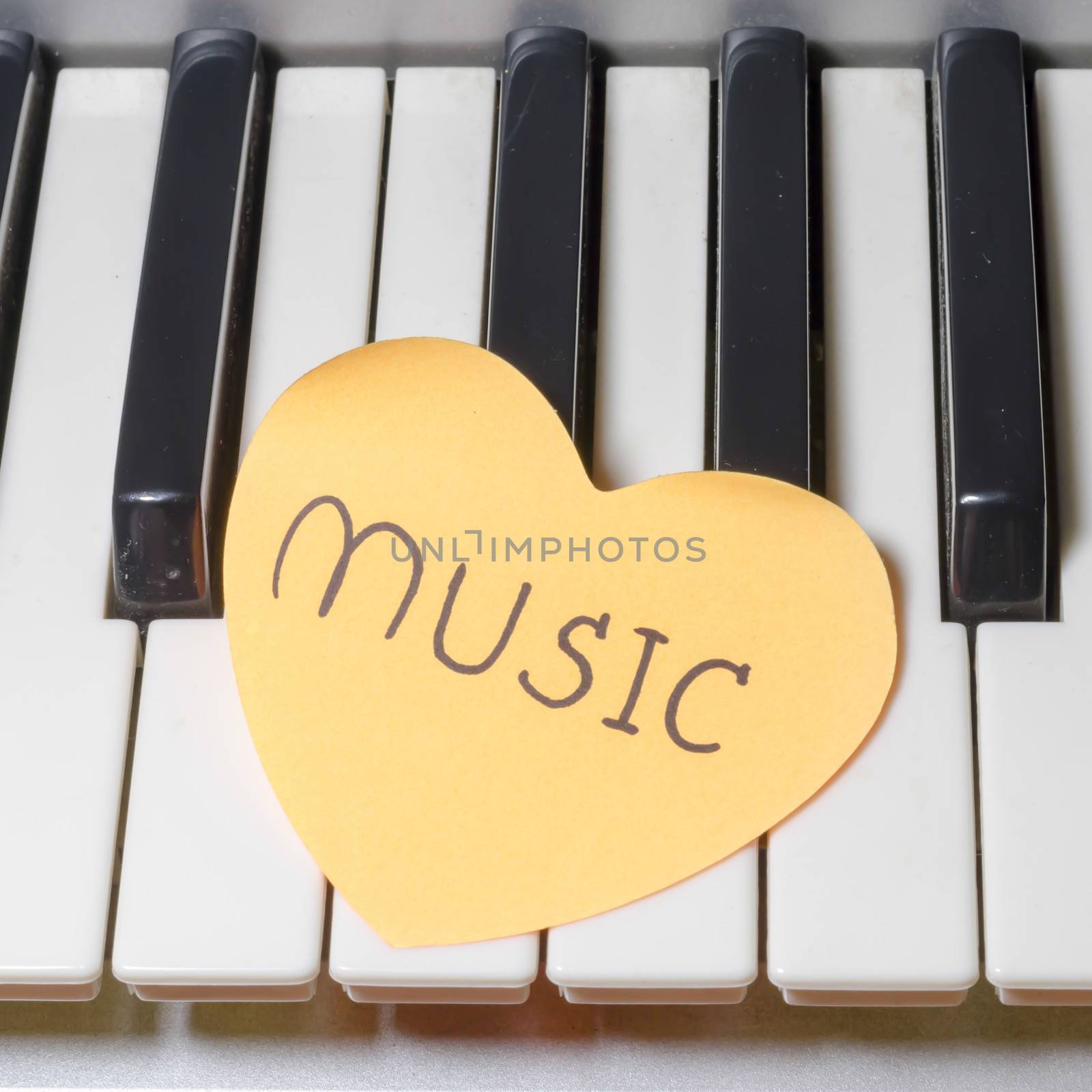 heart on key piano say love music