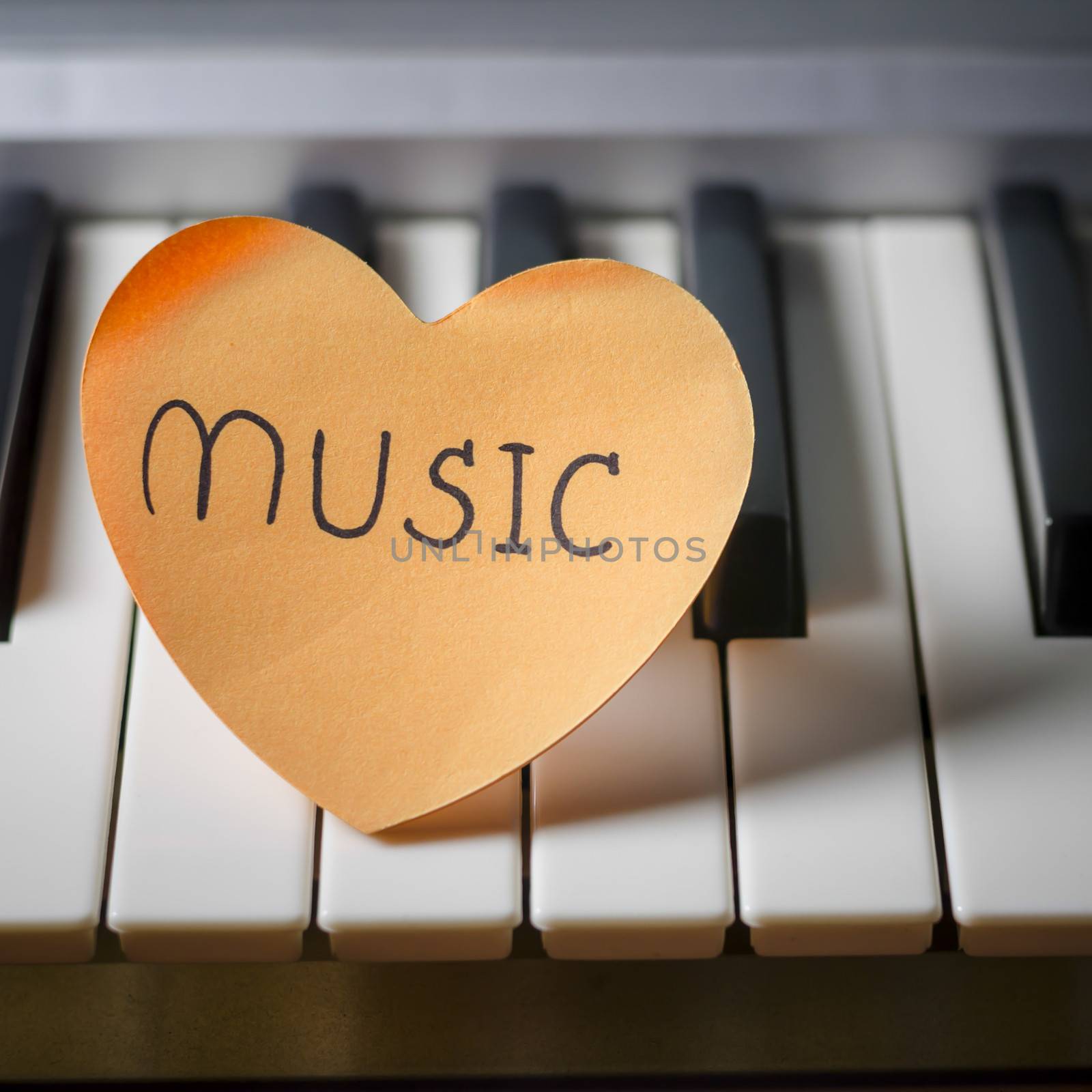 heart on key piano say love music