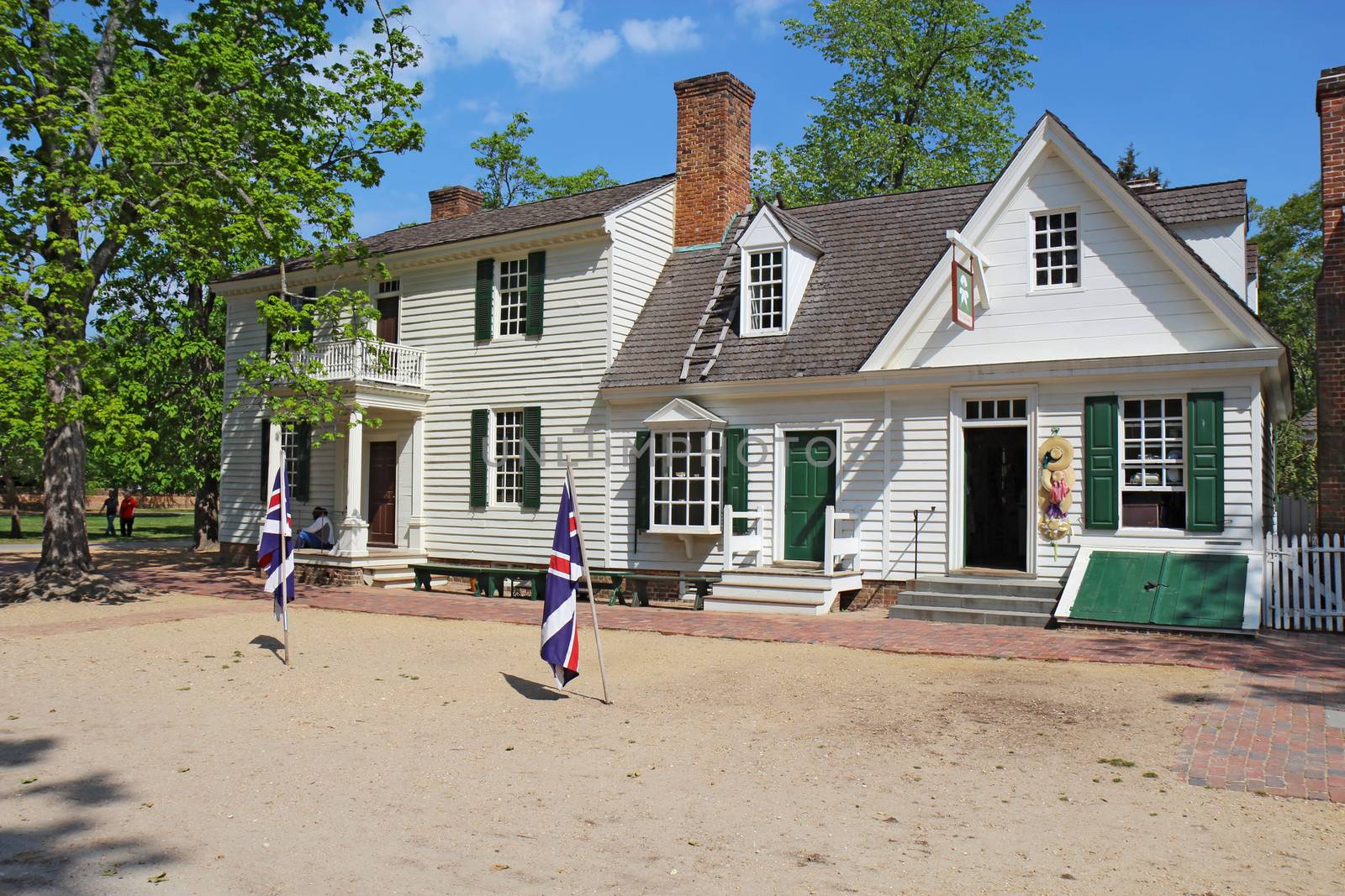WILLIAMSBURG, VIRGINIA - APRIL 21 2012: The Mary Dickinson shop historic millinery in Colonial Williamsburg. The restored town is a major attraction for tourists and meetings of world leaders.
