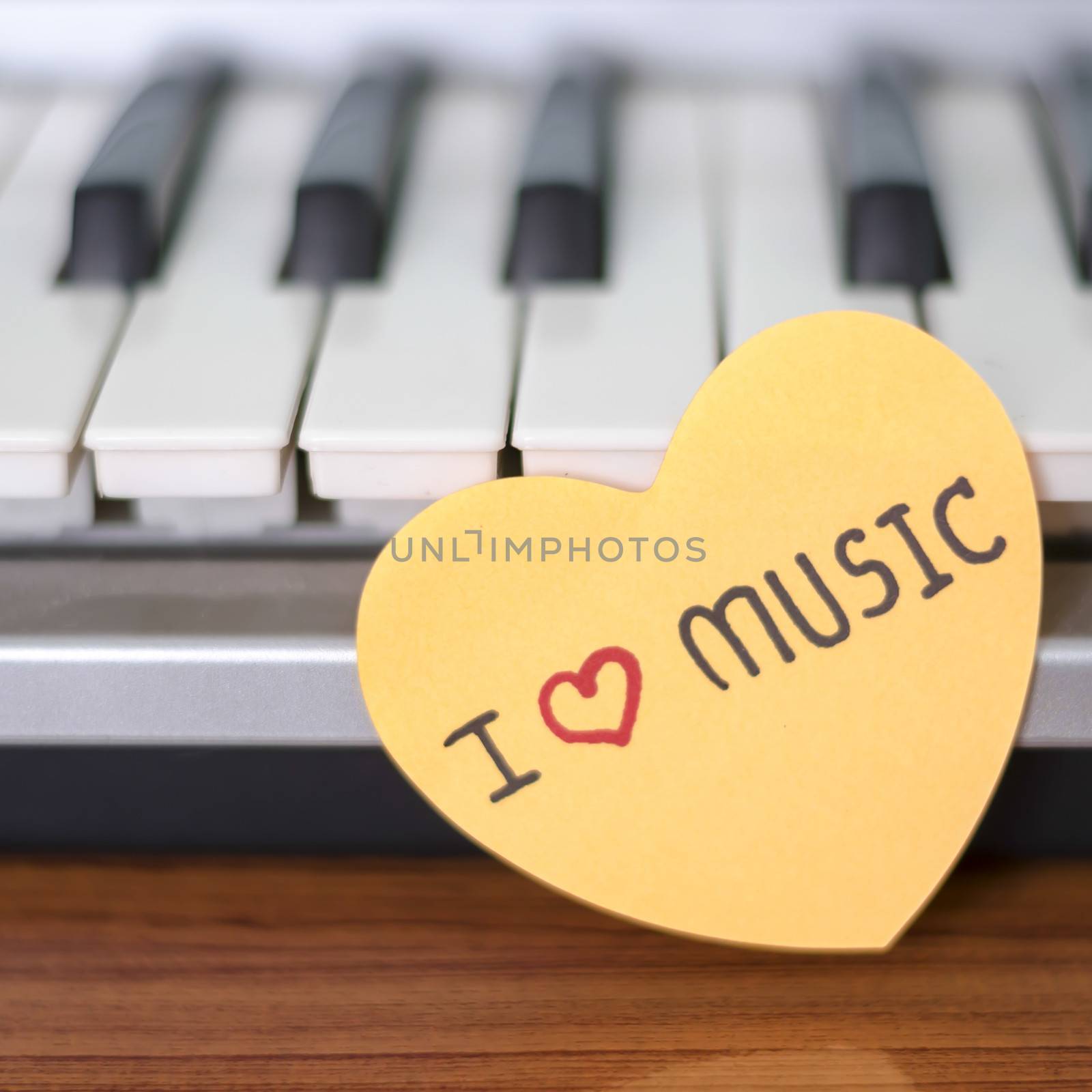 heart on key piano say love music