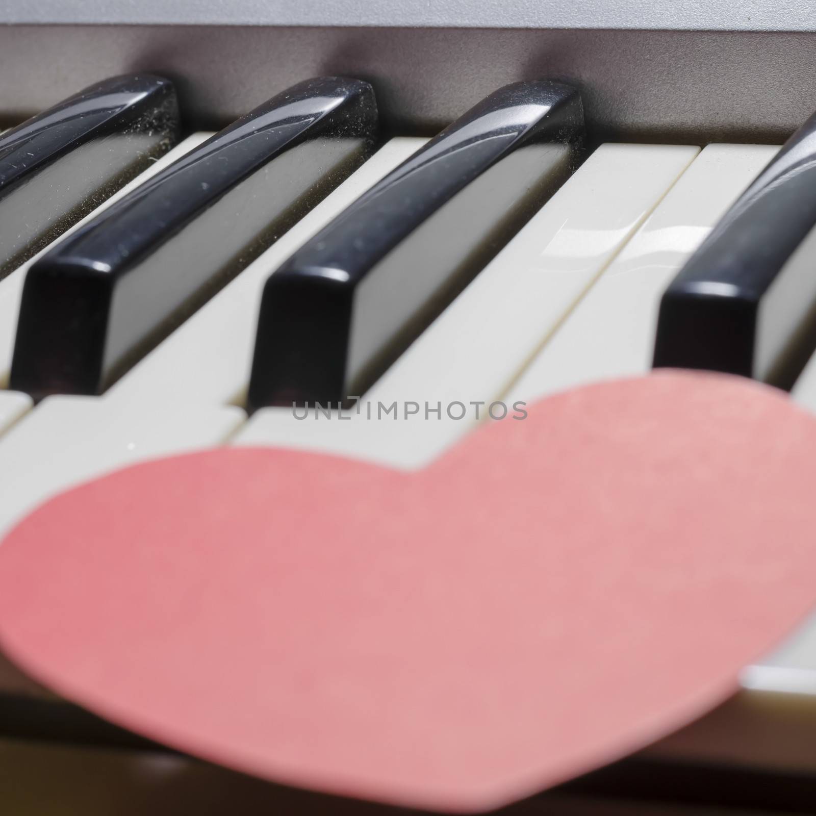 heart on key piano say love music
