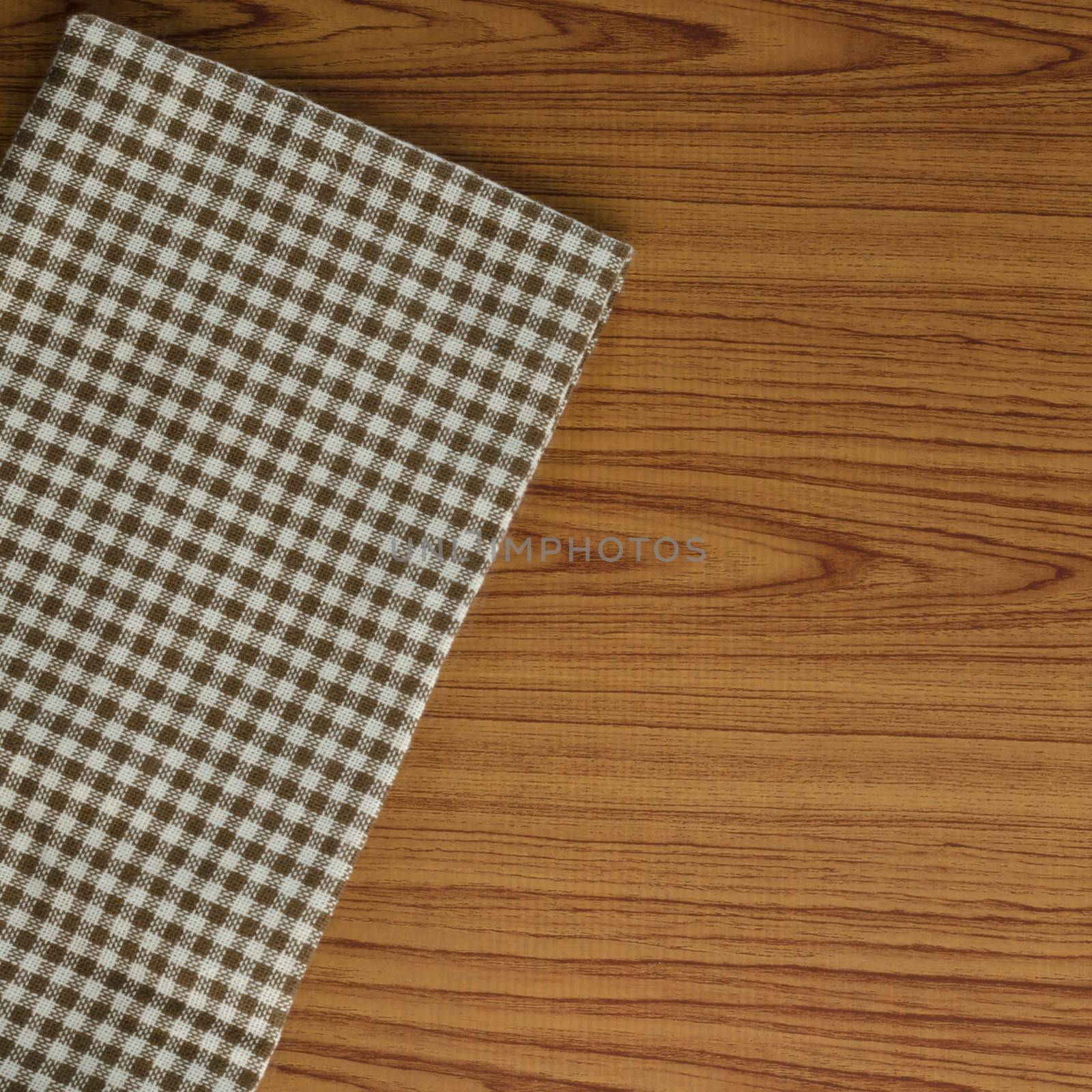 kitchen towel on wood background by ammza12