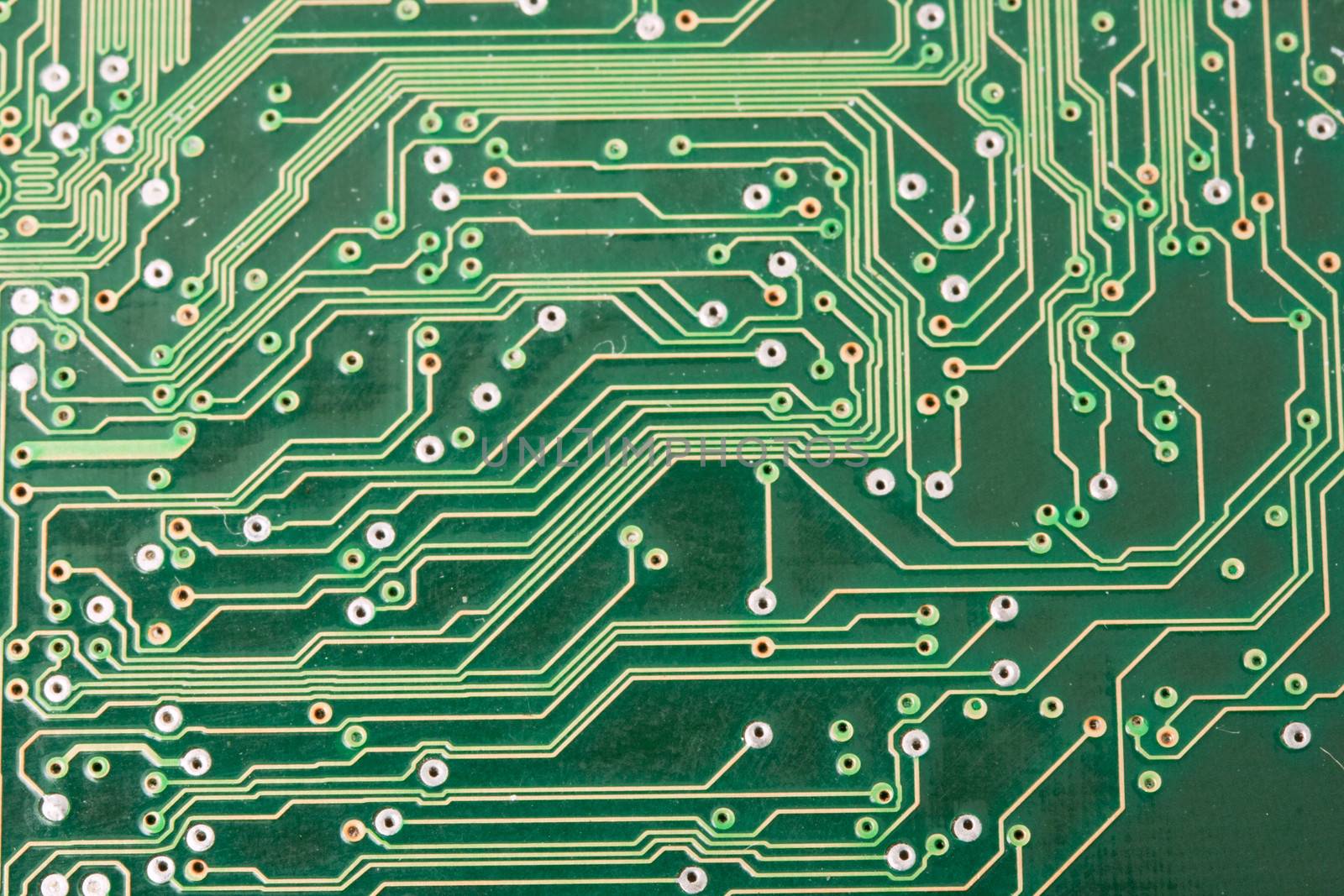 Close-up photo of electronic circuit board with integrated microchips
