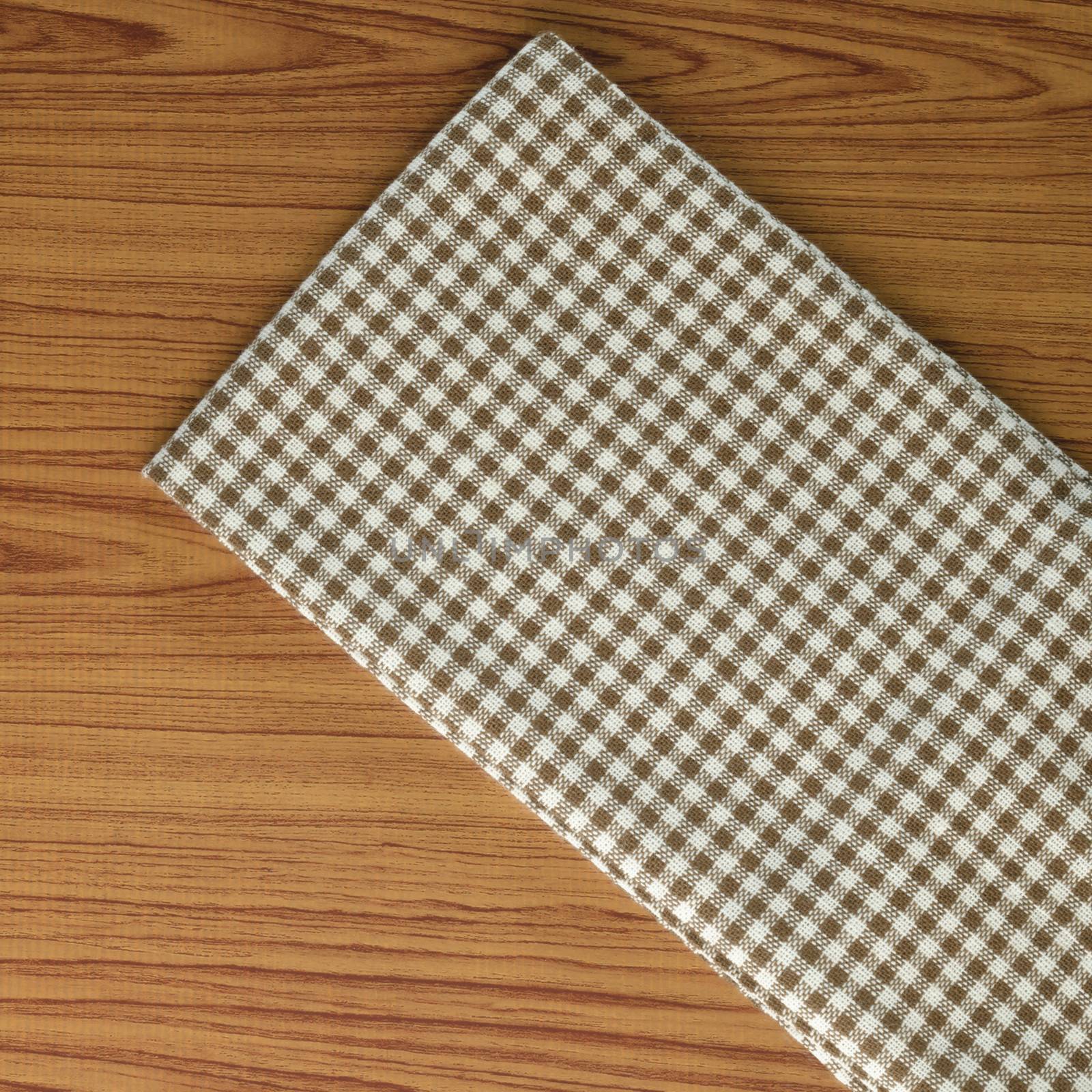 kitchen towel on wood background by ammza12